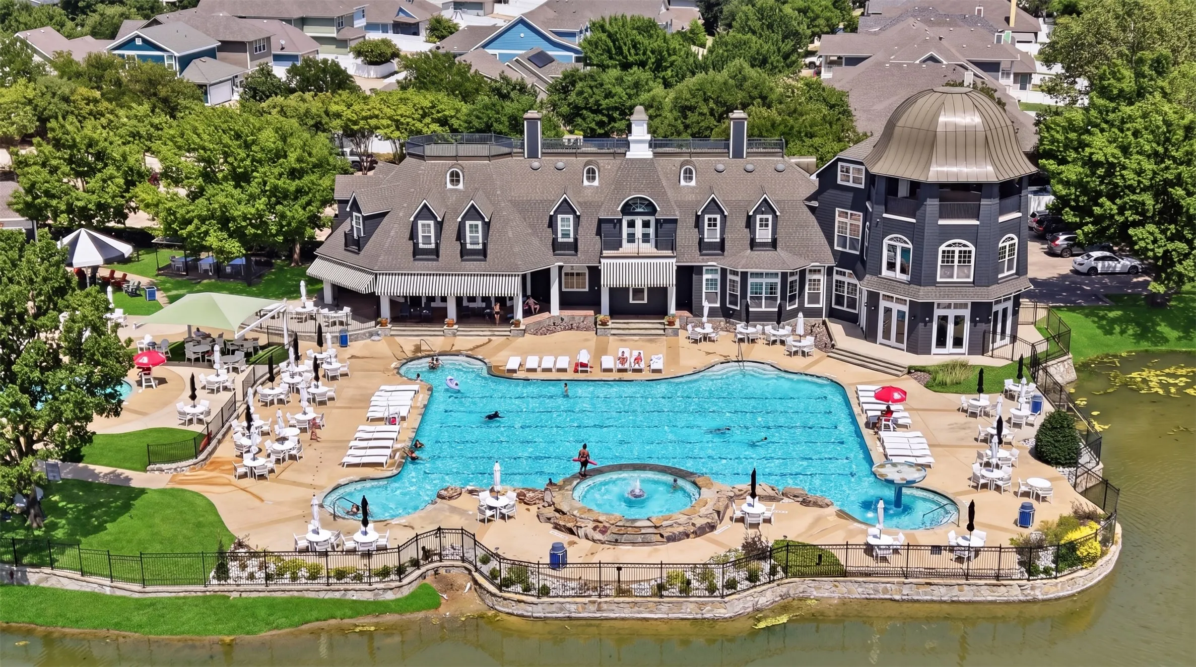 Residents enjoy access to premium community amenities, including a resort-style pool, clubhouse, outdoor gathering spaces, and beautifully maintained grounds.