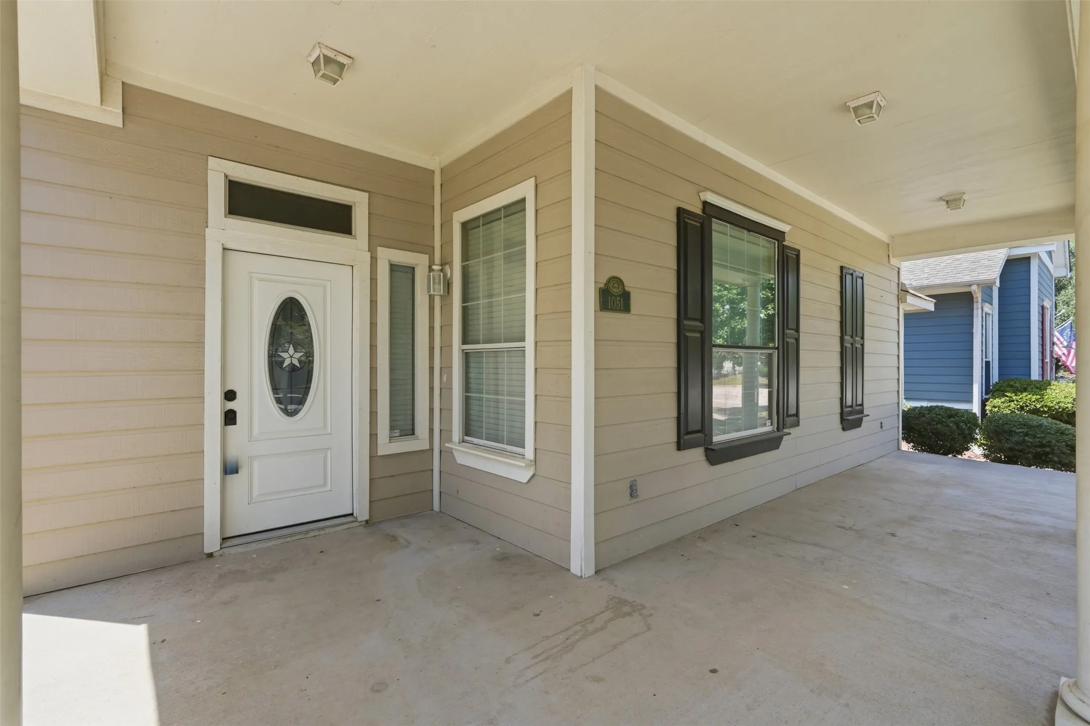 Spacious covered front porch offers the perfect place to relax, unwind, and enjoy the neighborhood.