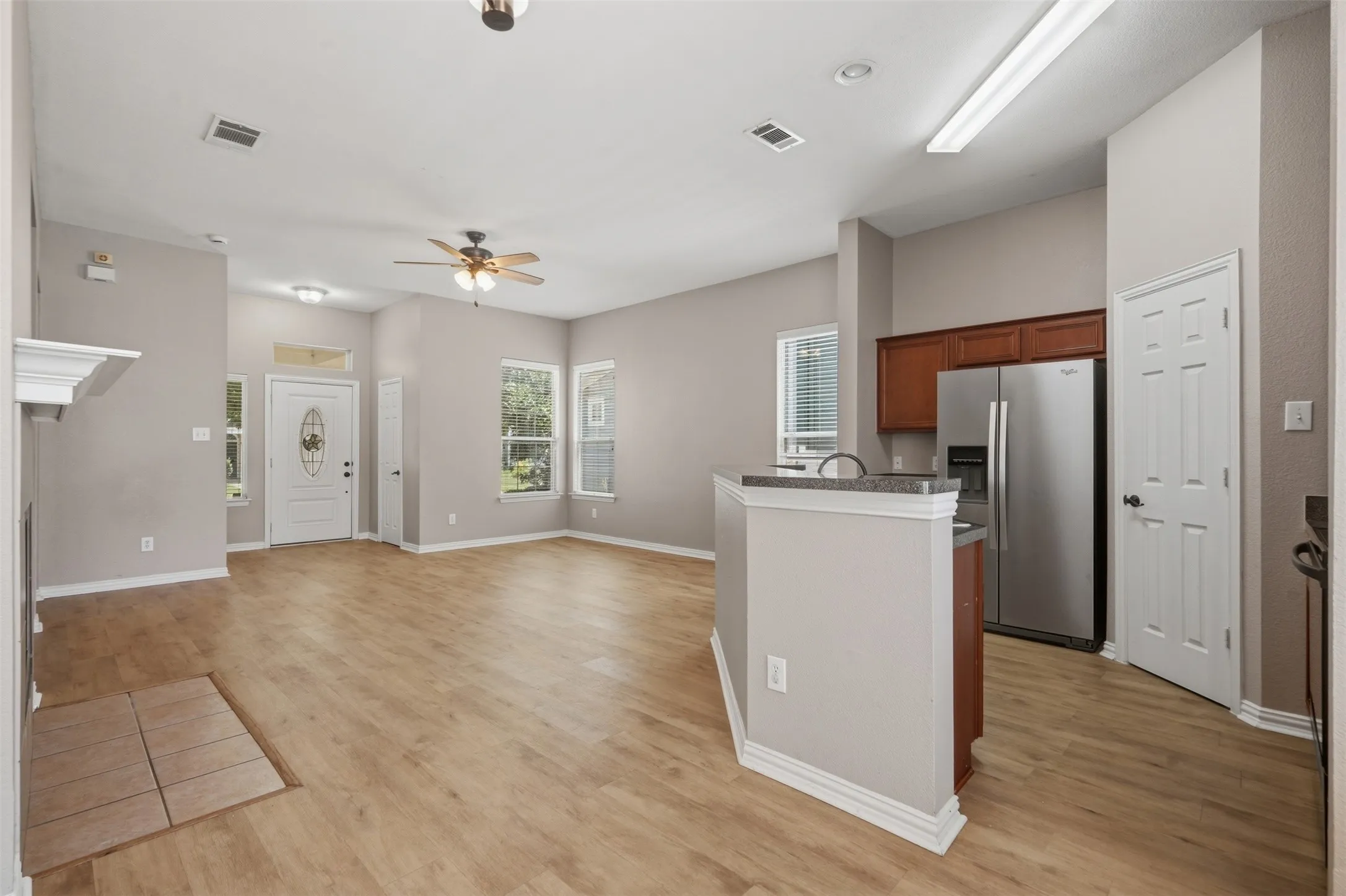Well-designed kitchen overlooks the main living area, creating an ideal layout for entertaining and everyday living.