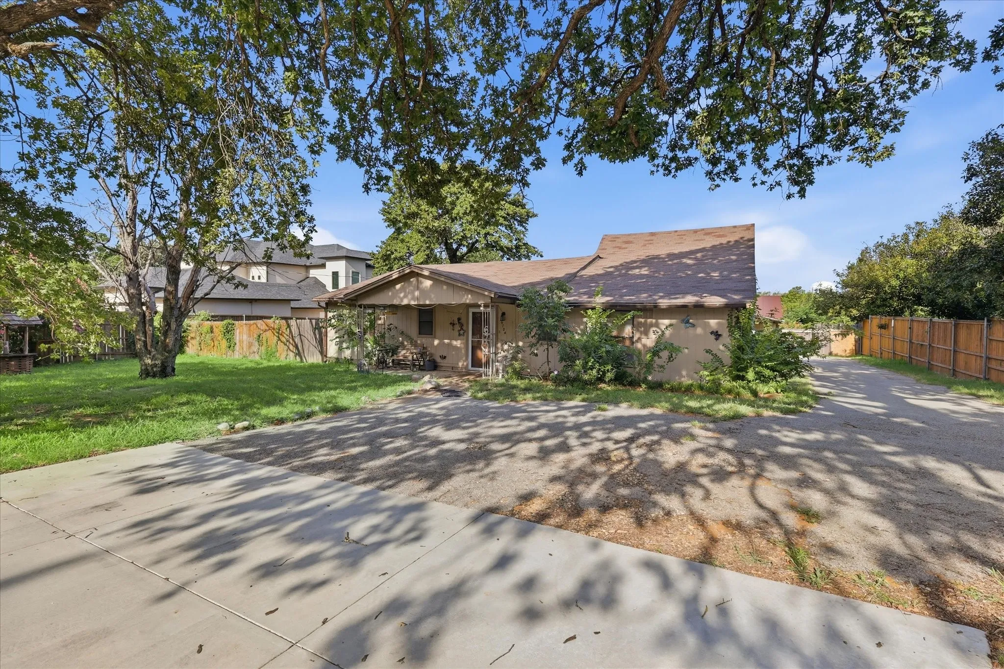 Single-story residence with a covered front porch and a gabled roof