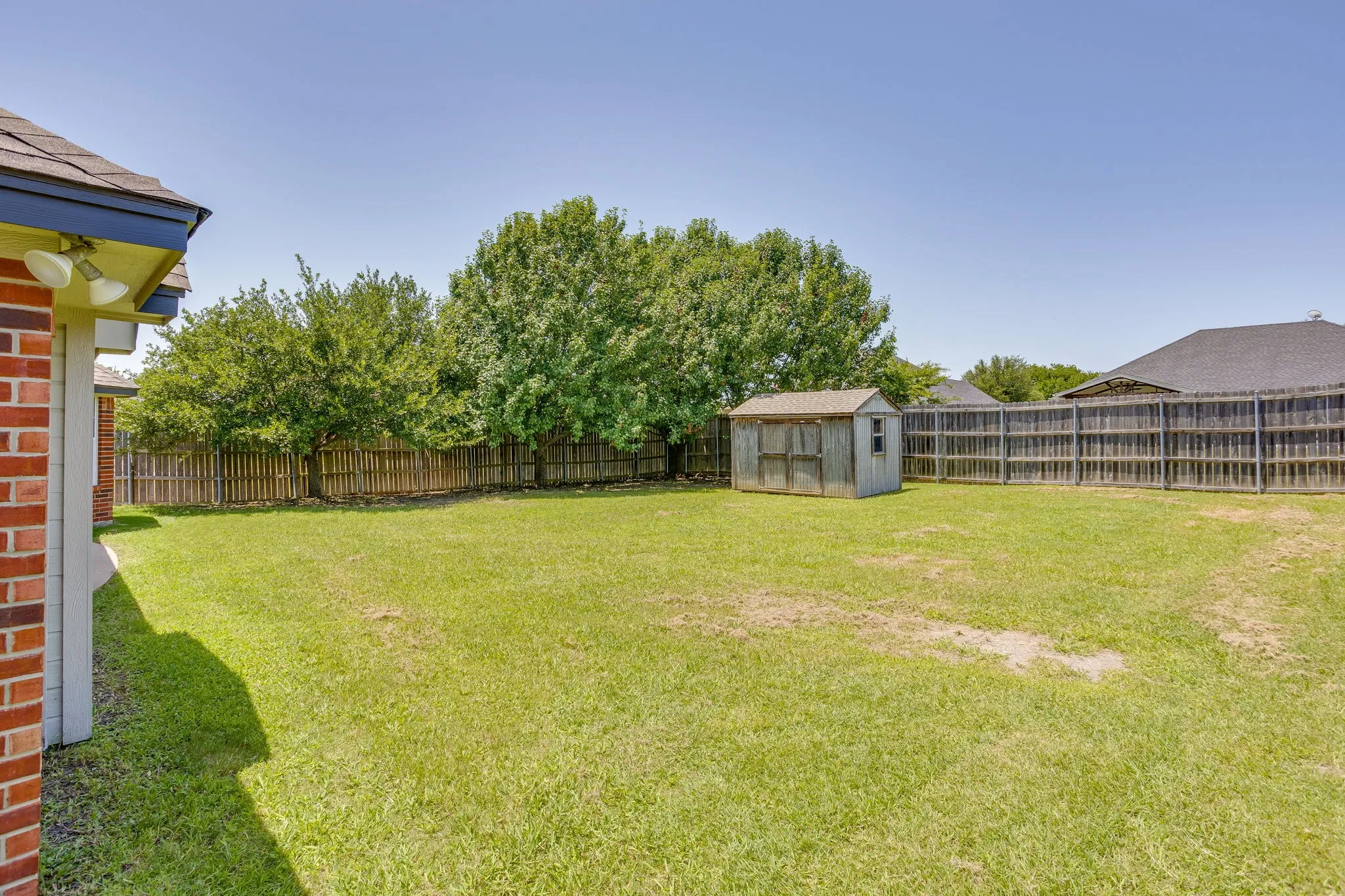 Back yard with storage shed