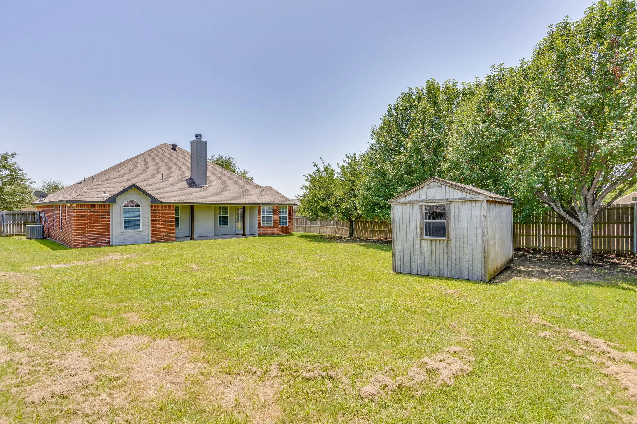 Back yard with storage shed