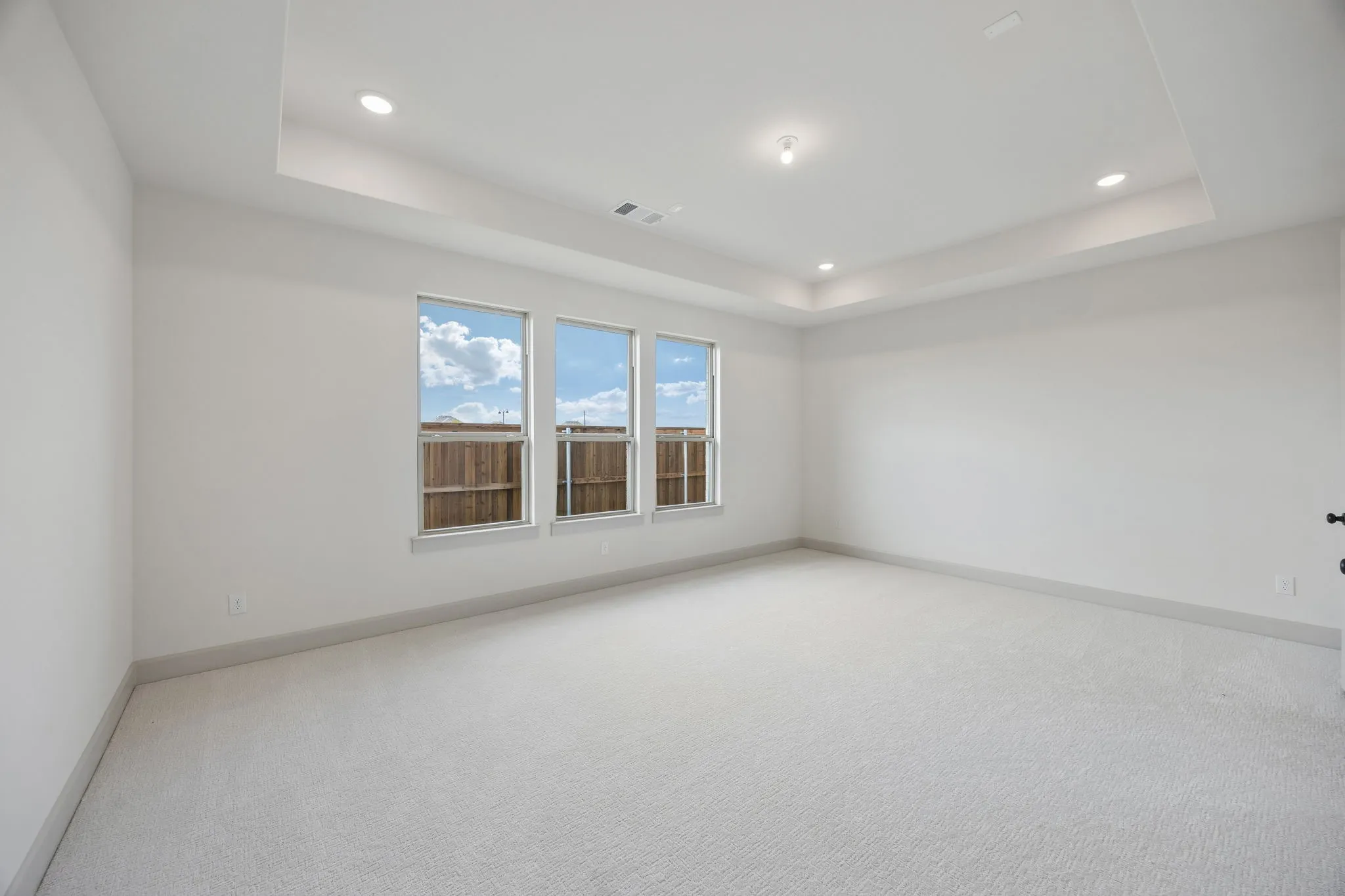 The peaceful owner's suite is located at the back of the home for additional privacy.