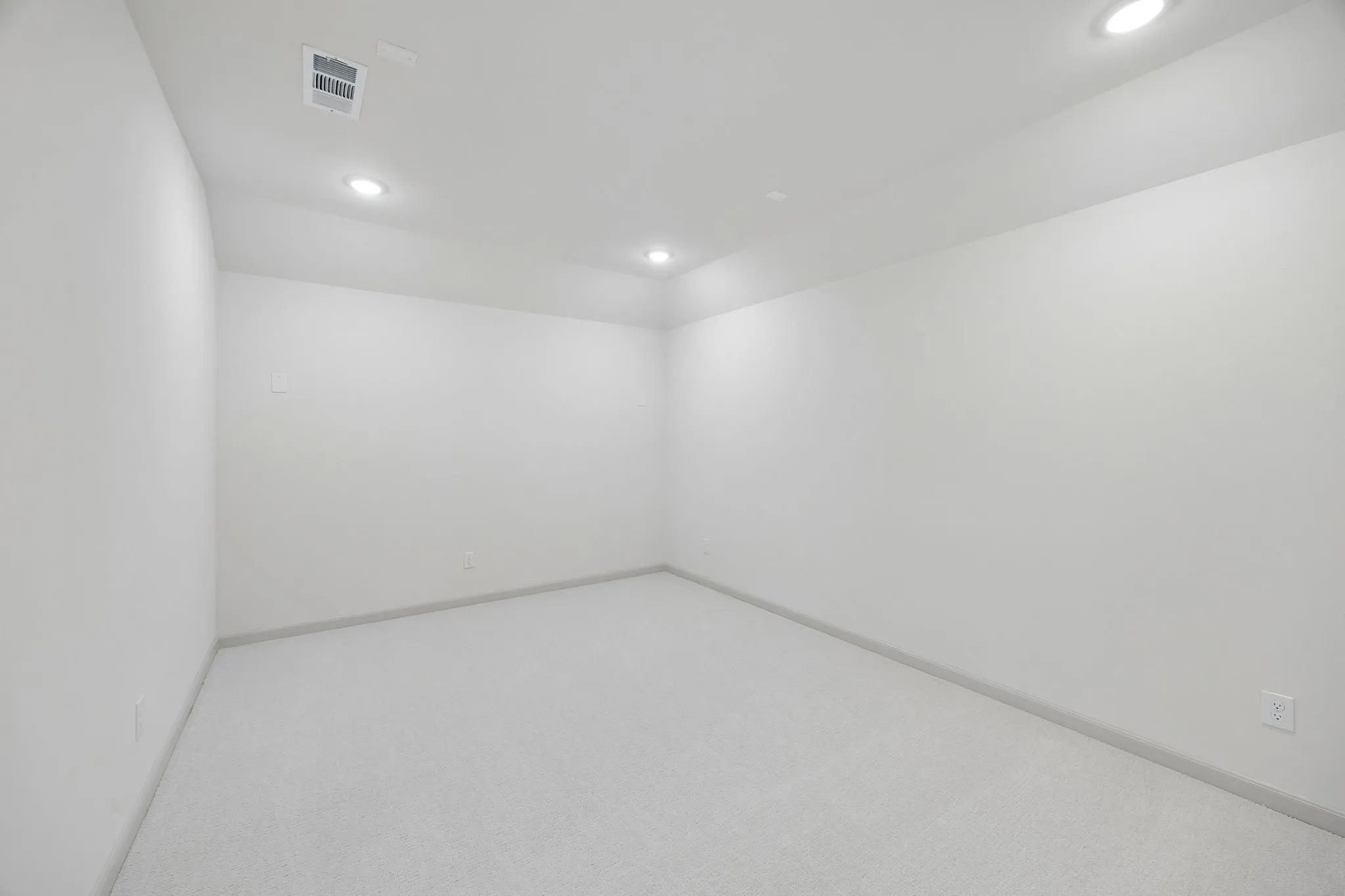 This spacious media room paired with adjacent game room create the ultimate family entertainment zone!