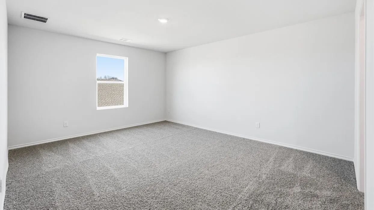 Neutral-toned room featuring a single window, recessed lighting, and light gray wall-to-wall carpeting