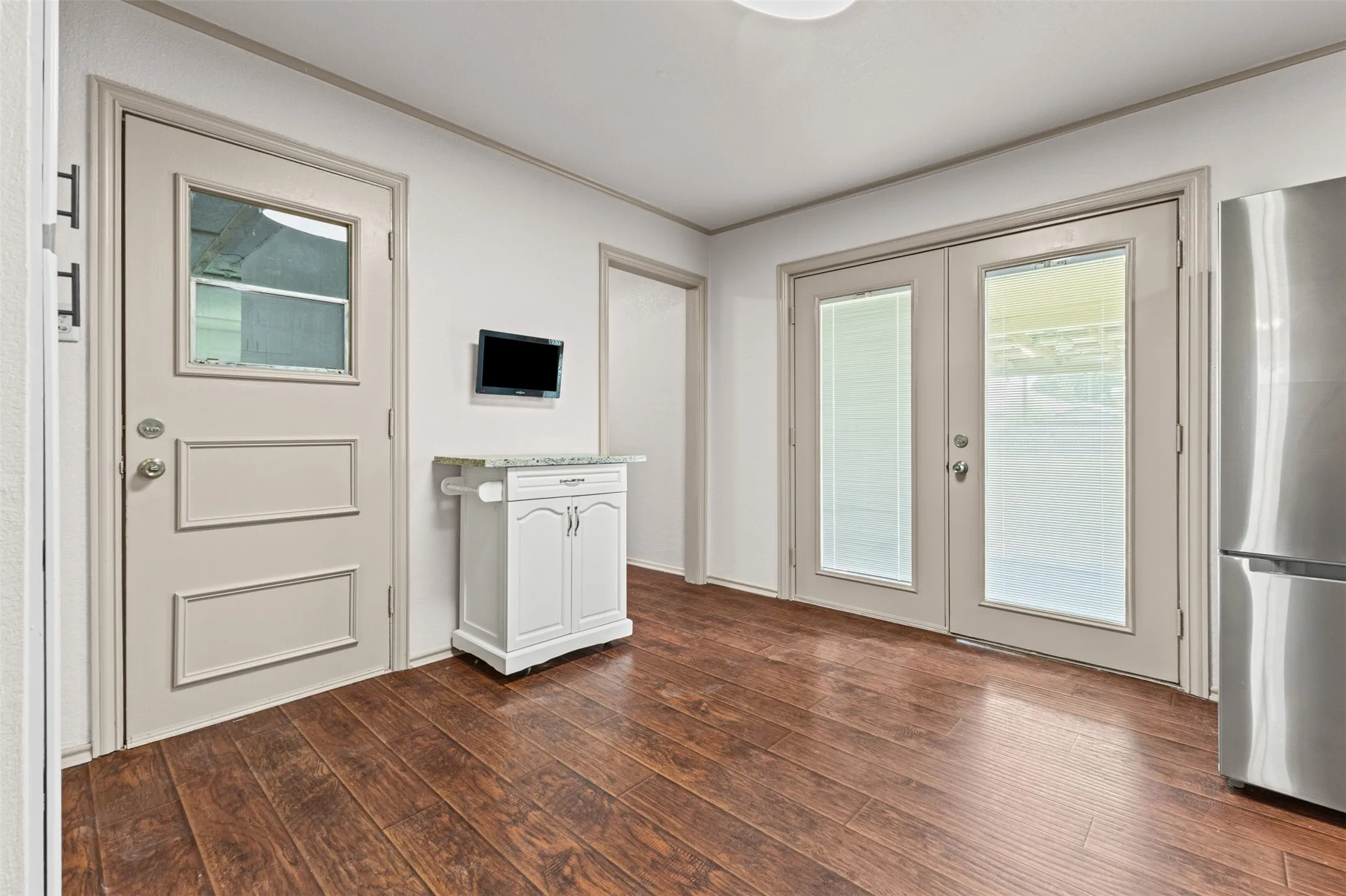 Wood-finish flooring throughout