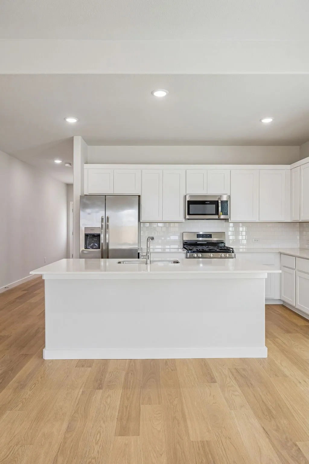 Kitchen in the Stanley II home plan by Trophy Signature Homes – REPRESENTATIVE PHOTO