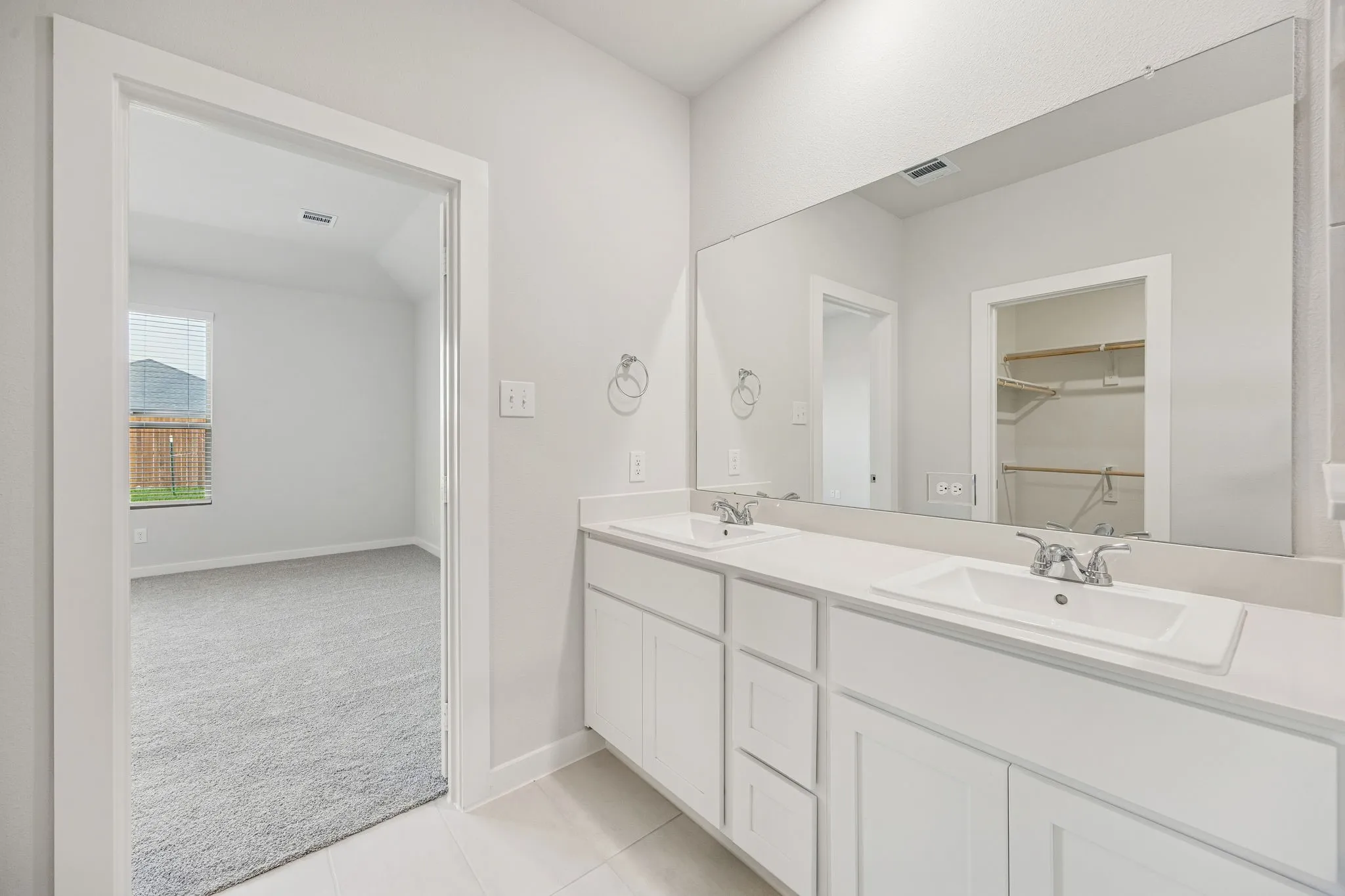Primary Bathroom in the Stanley II home plan by Trophy Signature Homes – REPRESENTATIVE PHOTO