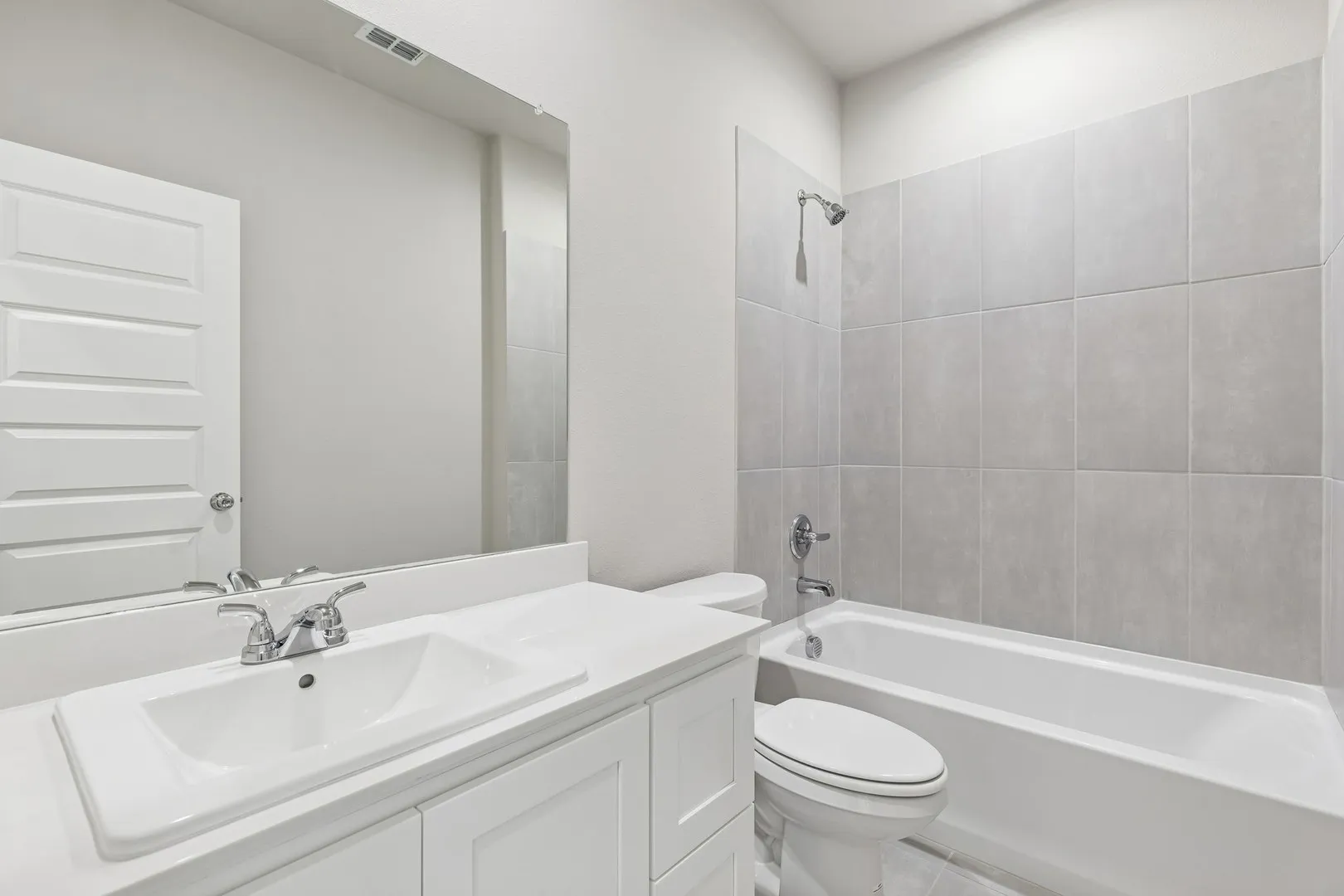 Bathroom in the Holden home plan by Trophy Signature Homes – REPRESENTATIVE PHOTO