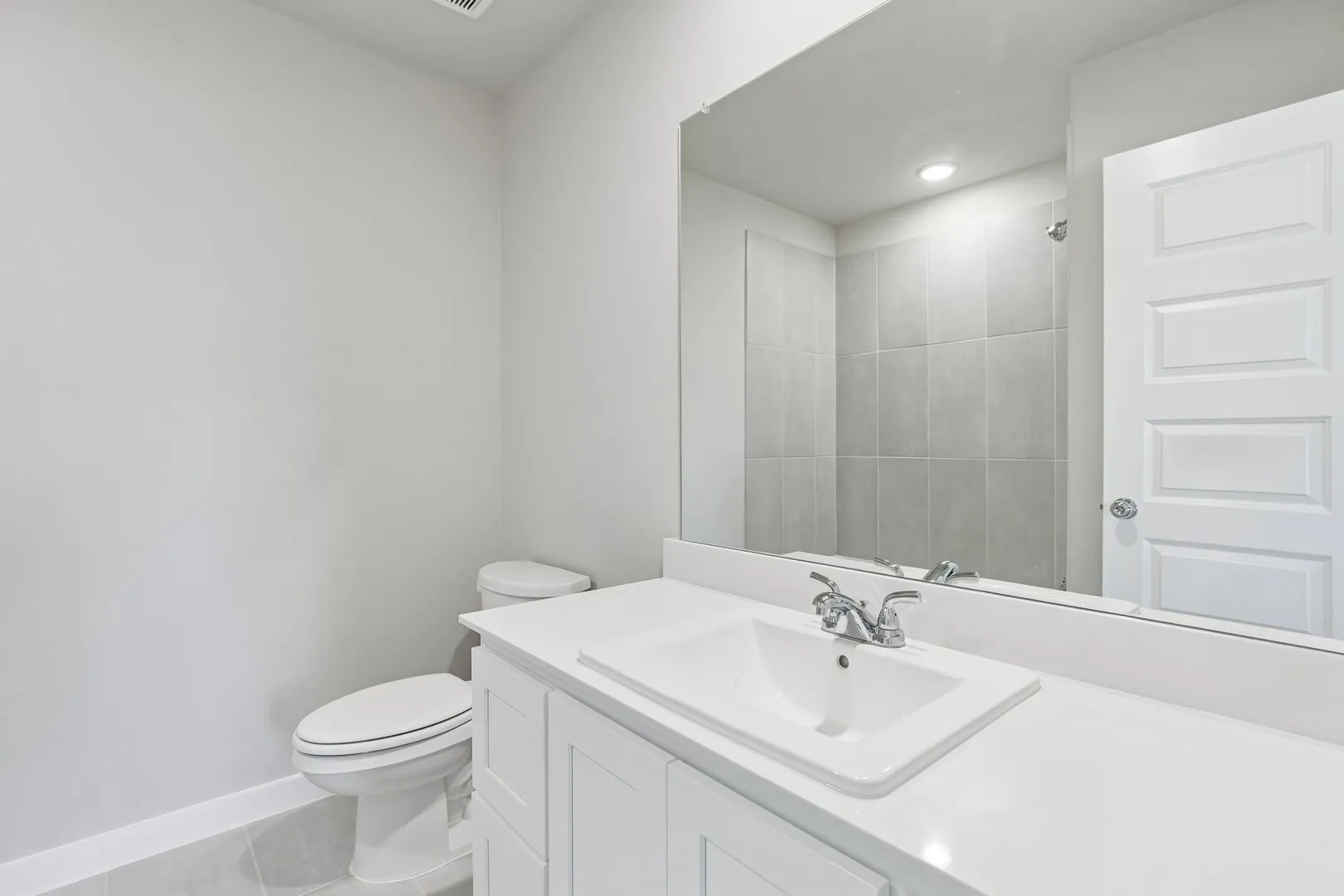 Bathroom in the Holden home plan by Trophy Signature Homes – REPRESENTATIVE PHOTO