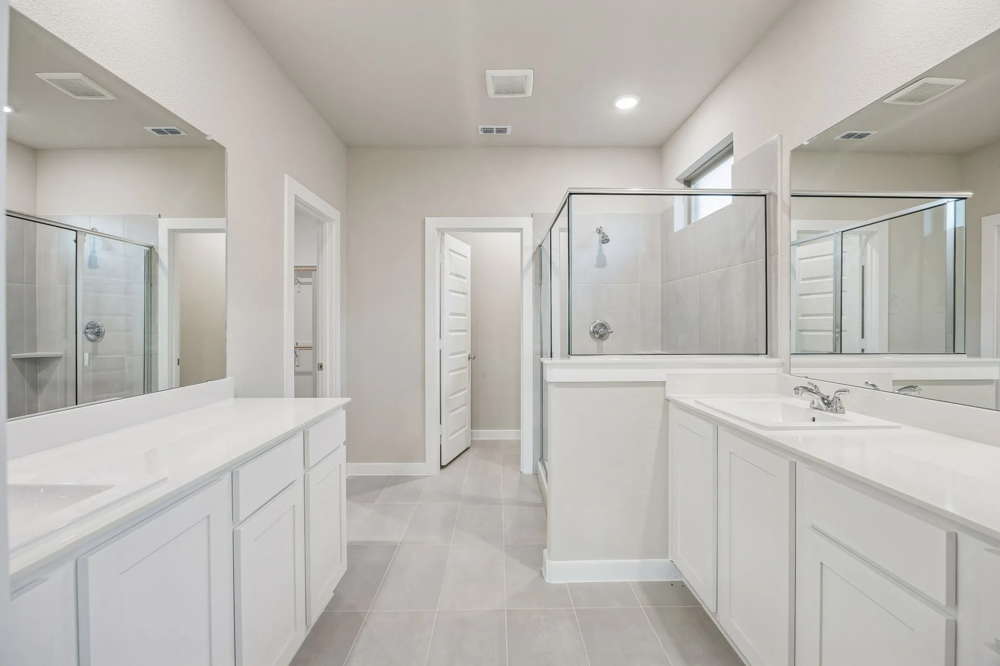 Primary Bathroom in the Wimbledon home plan by Trophy Signature Homes – REPRESENTATIVE PHOTO