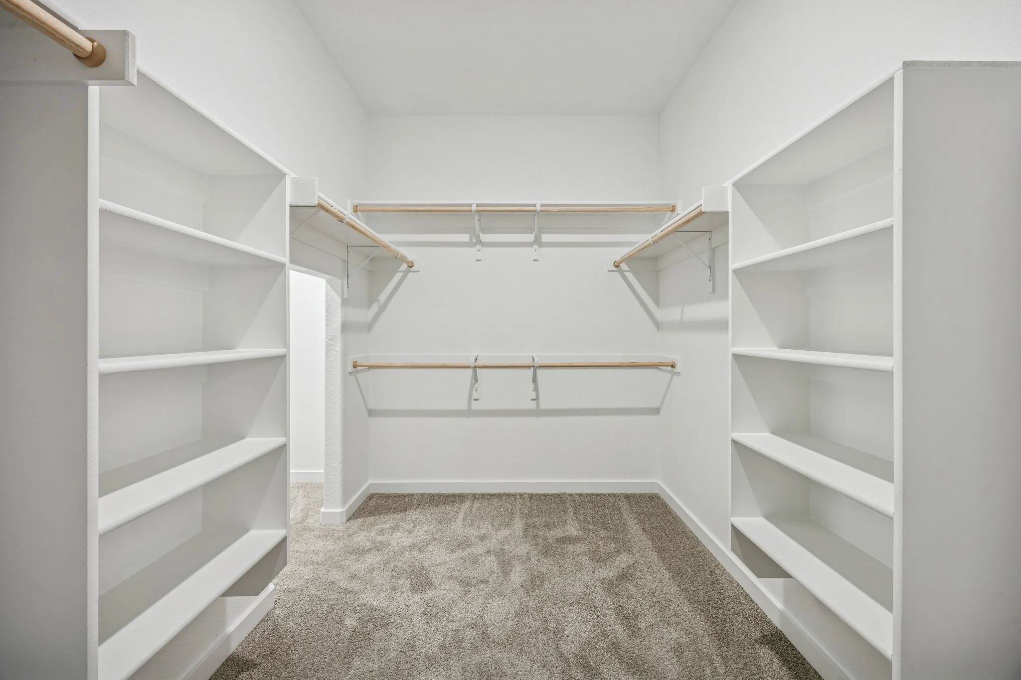 Primary Closet in the Wimbledon home plan by Trophy Signature Homes – REPRESENTATIVE PHOTO