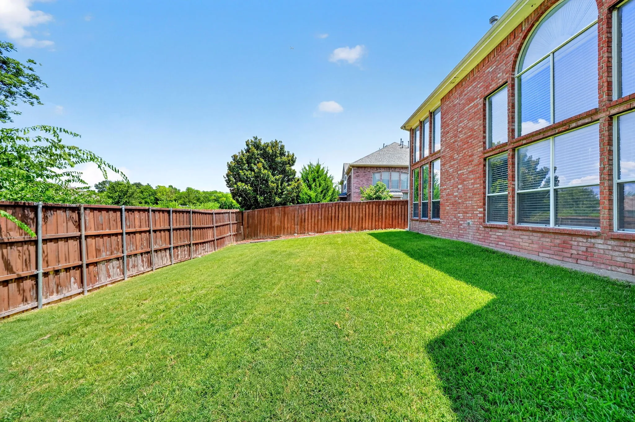 Spacious fenced backyard