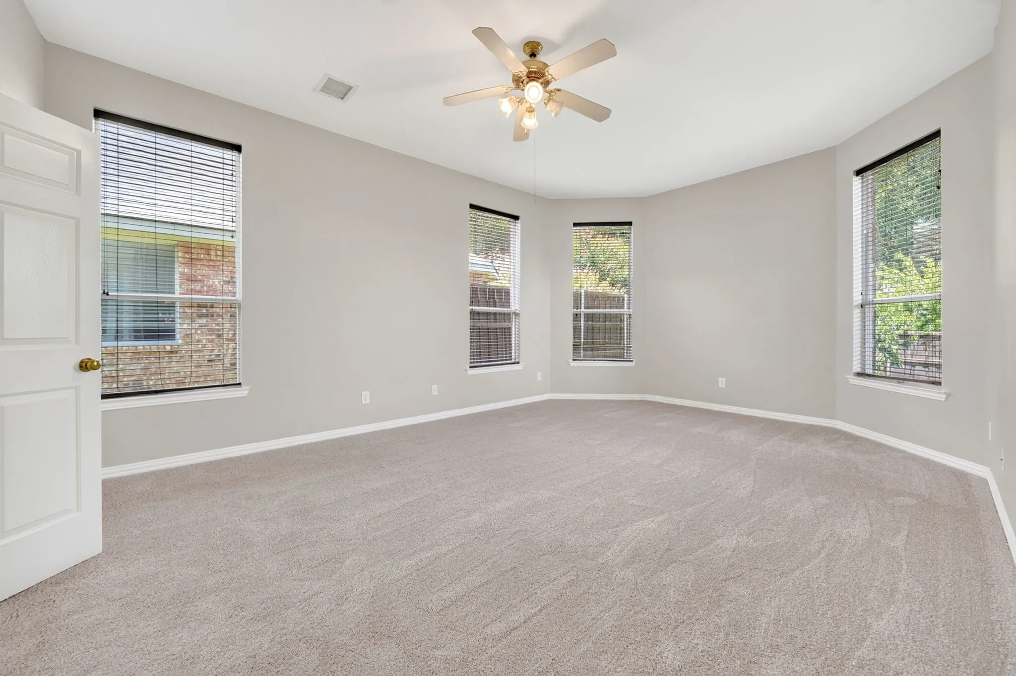 Spacious first-floor primary bedroom