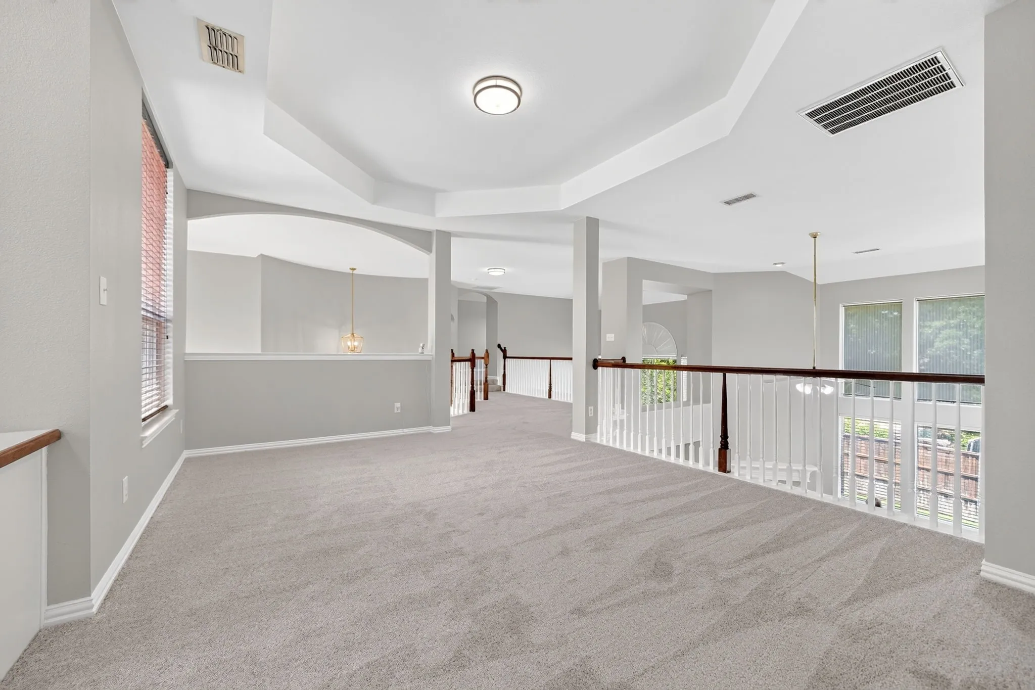 Open loft overlooking the two-story family room
