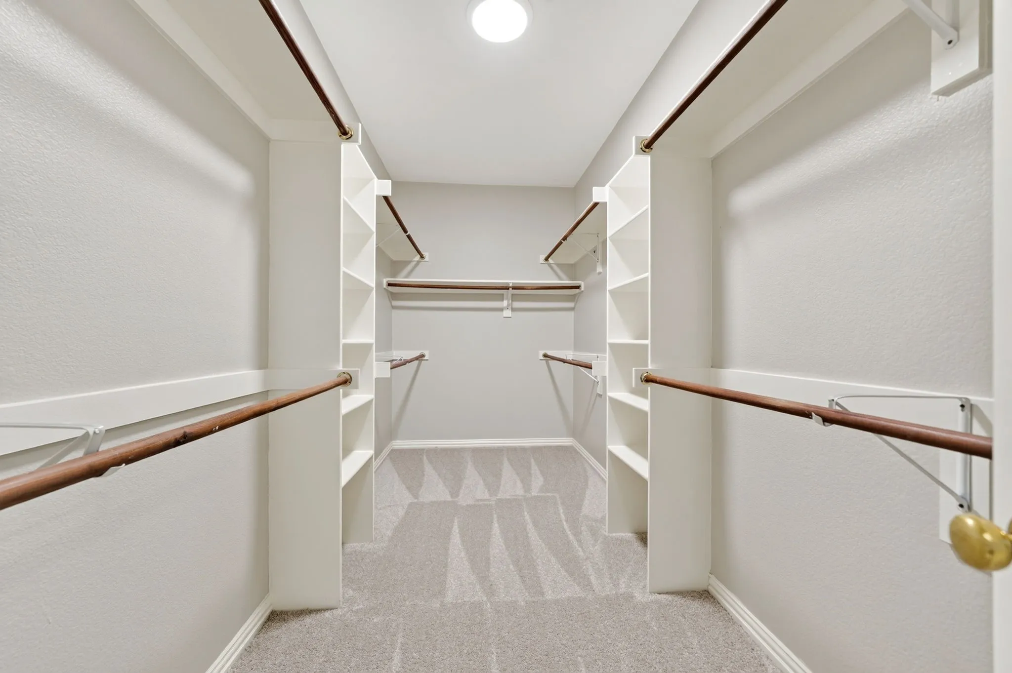 Oversized primary walk-in closet
