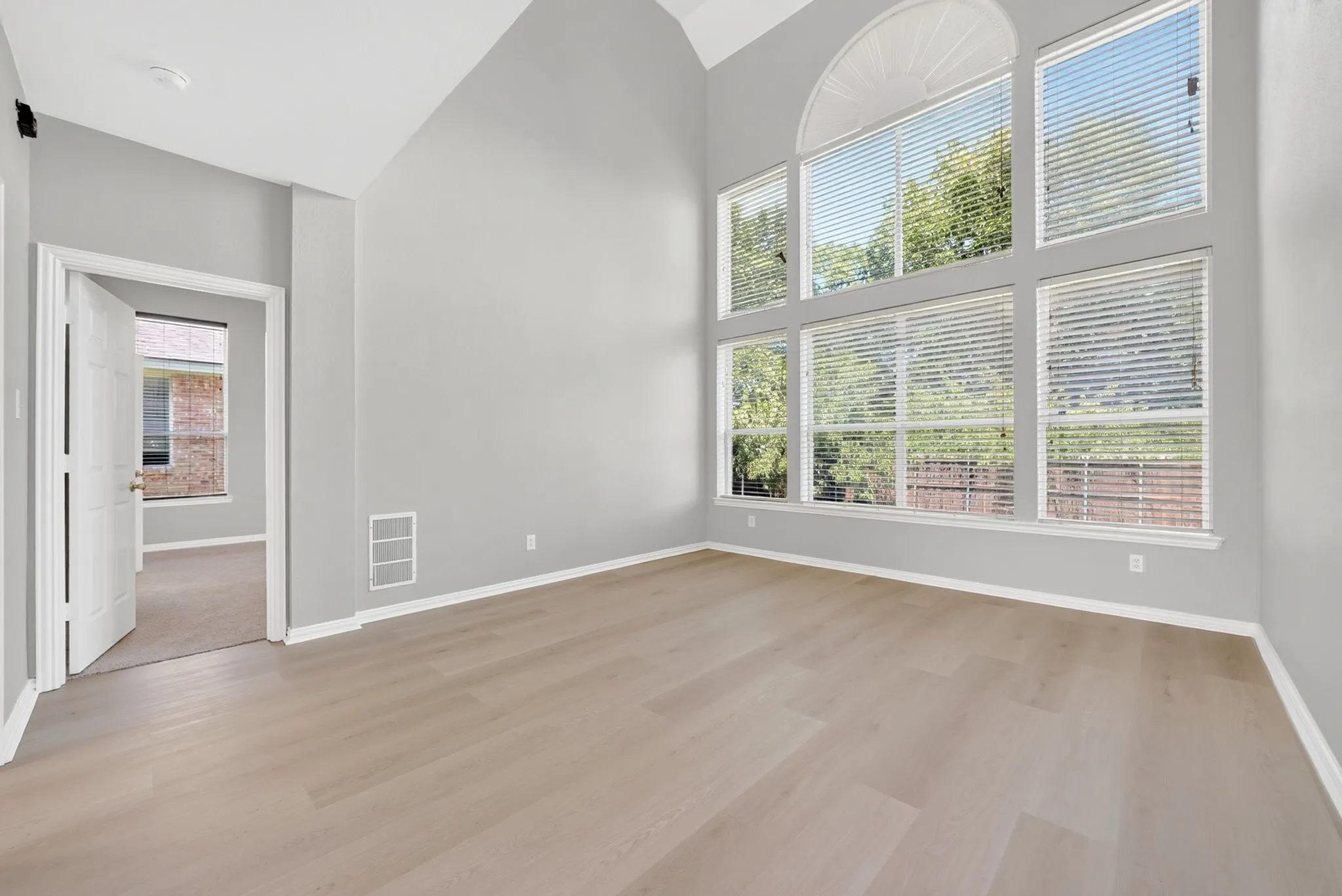 Formal living room with wall of windows