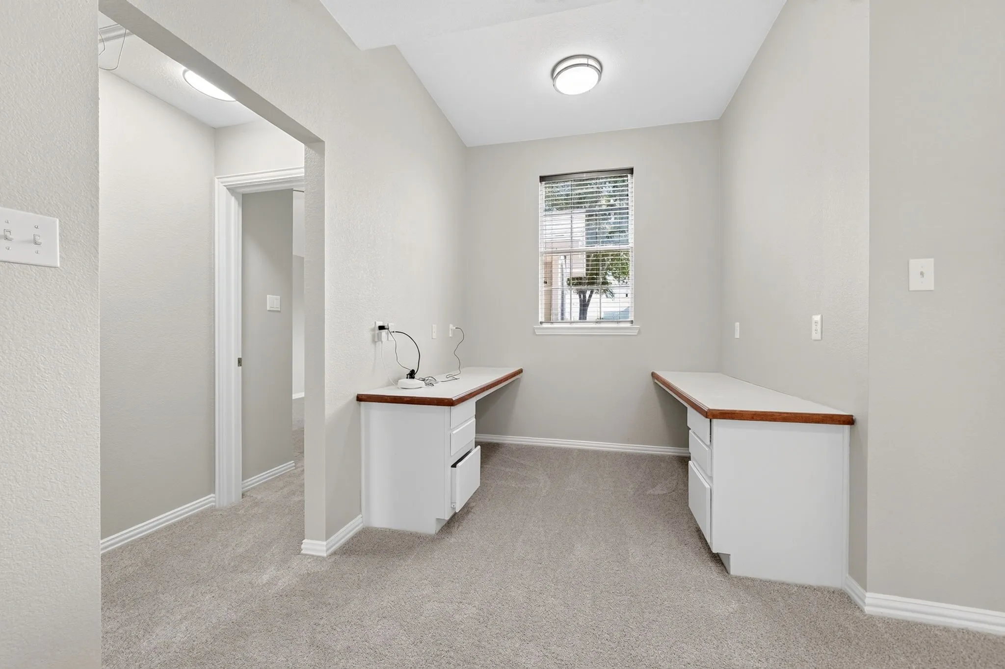 Loft with dual built-in workstations