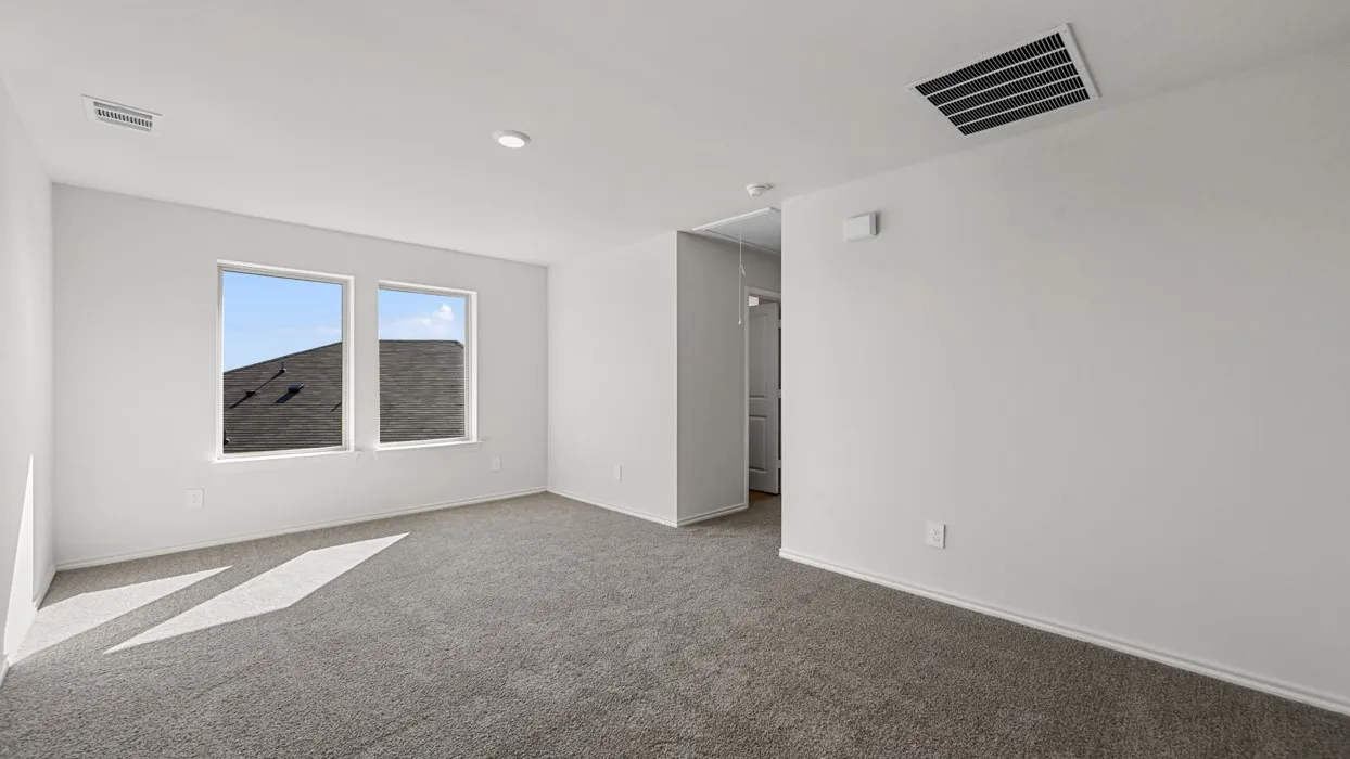Carpeted room featuring two prominent windows, recessed lighting, white baseboards, and a white ceiling with air vents