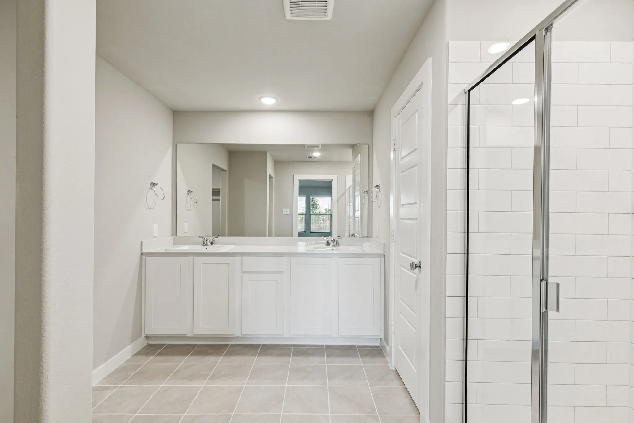 Primary Bathroom in the Harper home plan by Trophy Signature Homes – REPRESENTATIVE PHOTO
