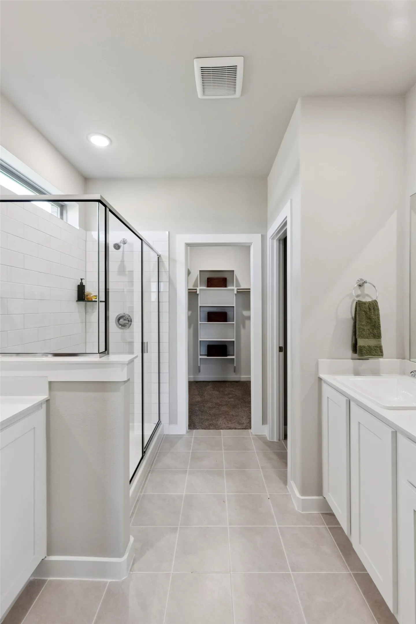 Primary Bathroom in the Magnolia home plan by Trophy Signature Homes – REPRESENTATIVE PHOTO