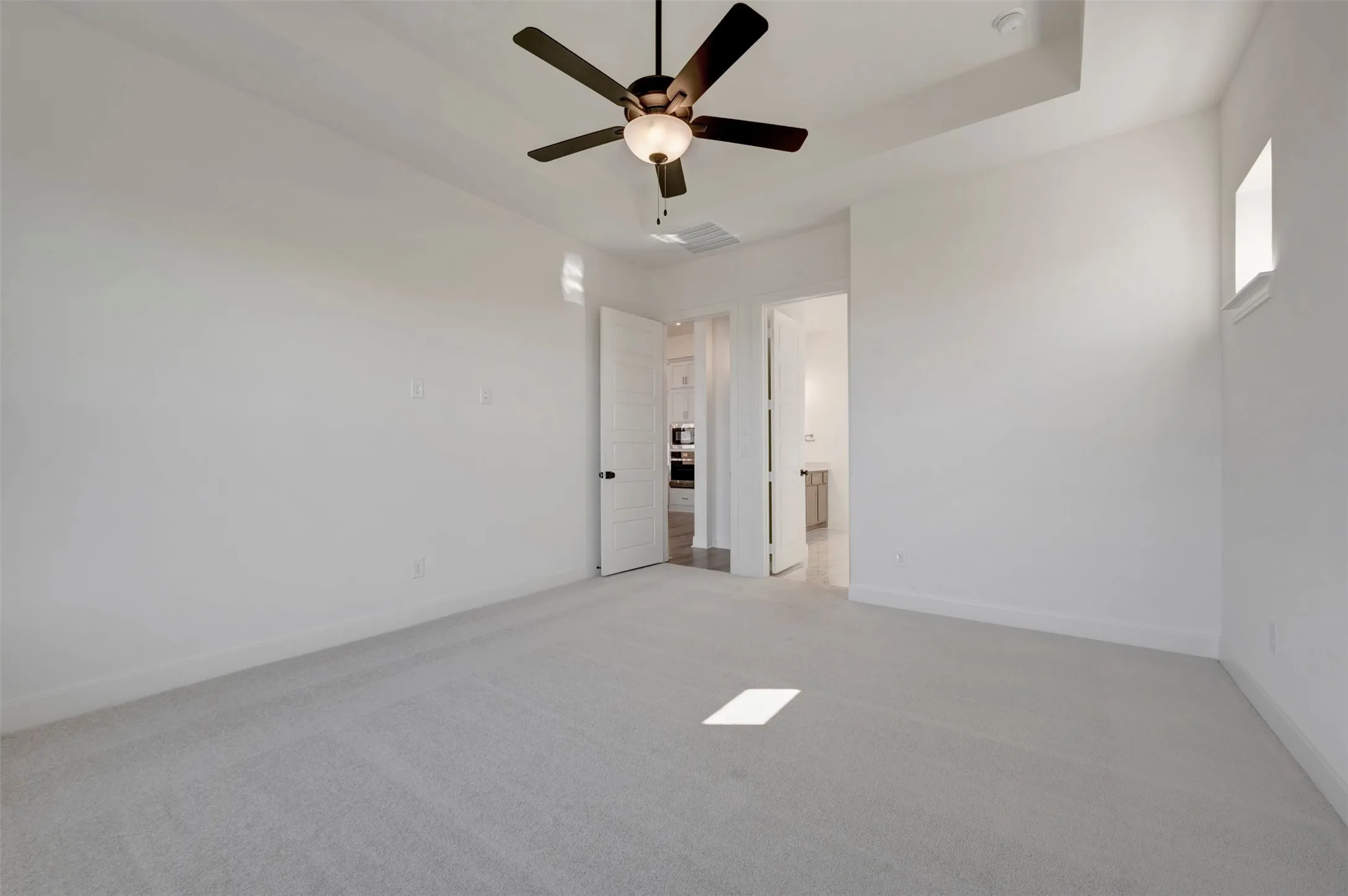 Recessed ceiling with an attached ceiling fan and light fixture