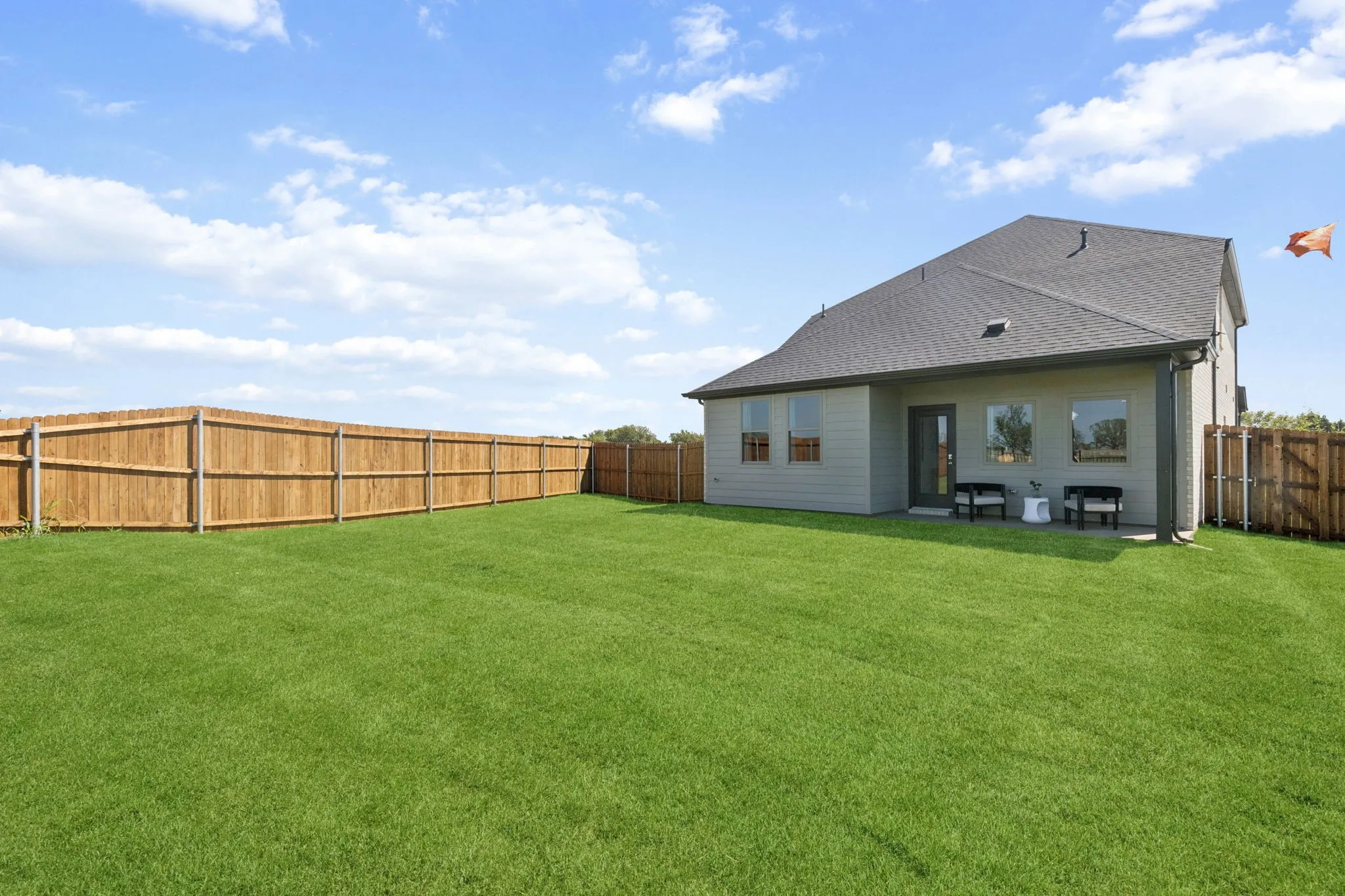 Backyard in the Magnolia home plan by Trophy Signature Homes – REPRESENTATIVE PHOTO