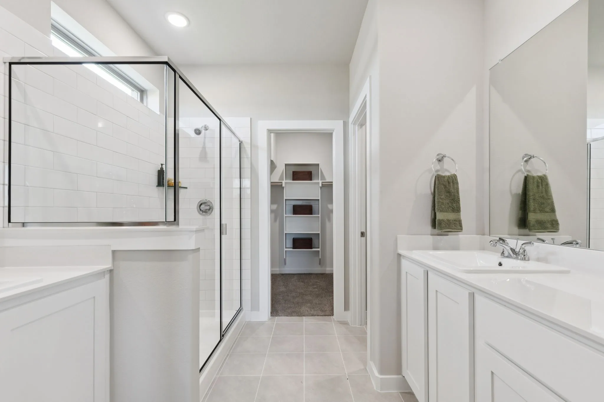 Primary Bathroom in the Magnolia home plan by Trophy Signature Homes – REPRESENTATIVE PHOTO
