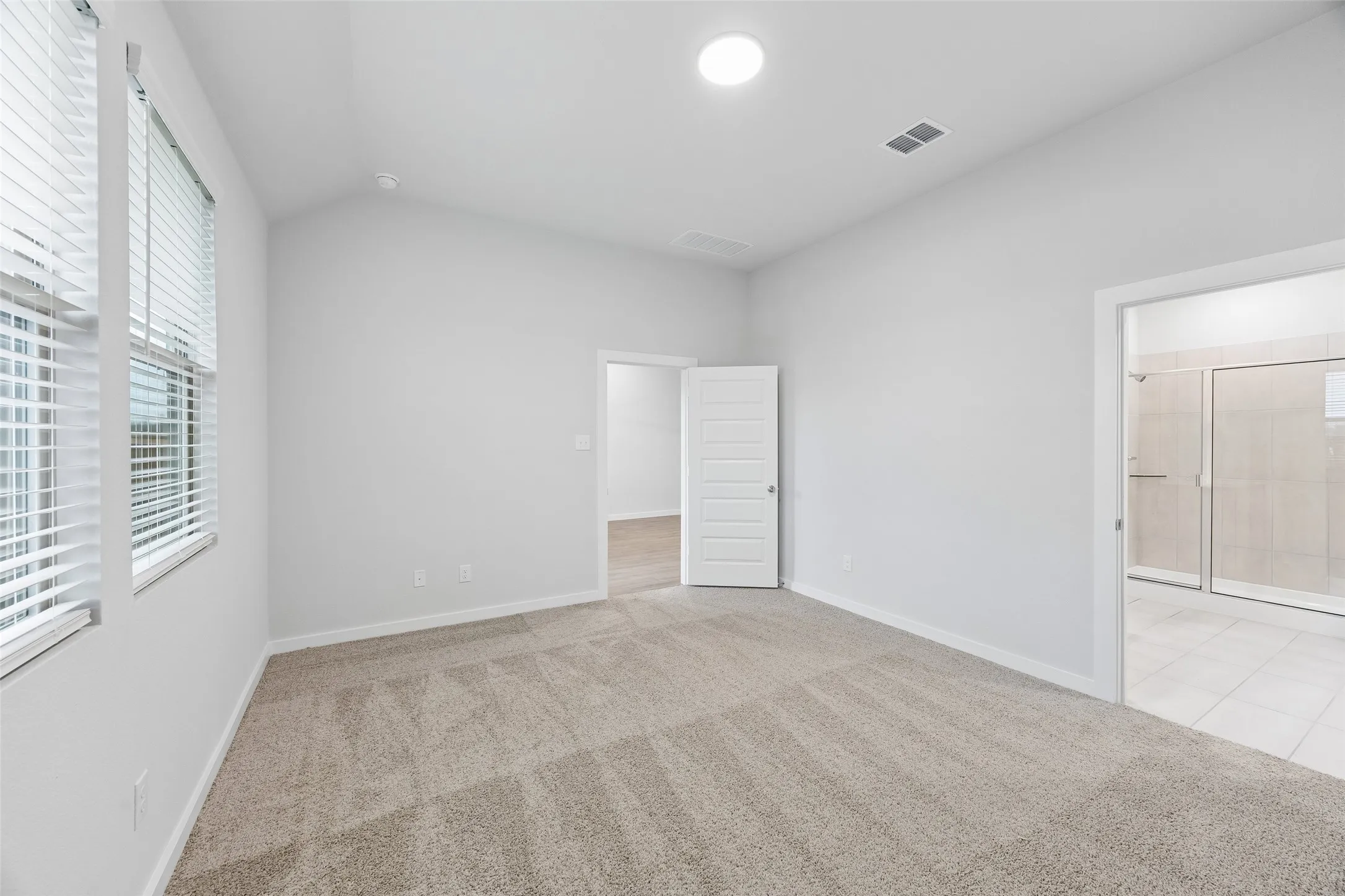 Primary Suite in the Cedar home plan by Trophy Signature Homes – REPRESENTATIVE PHOTO