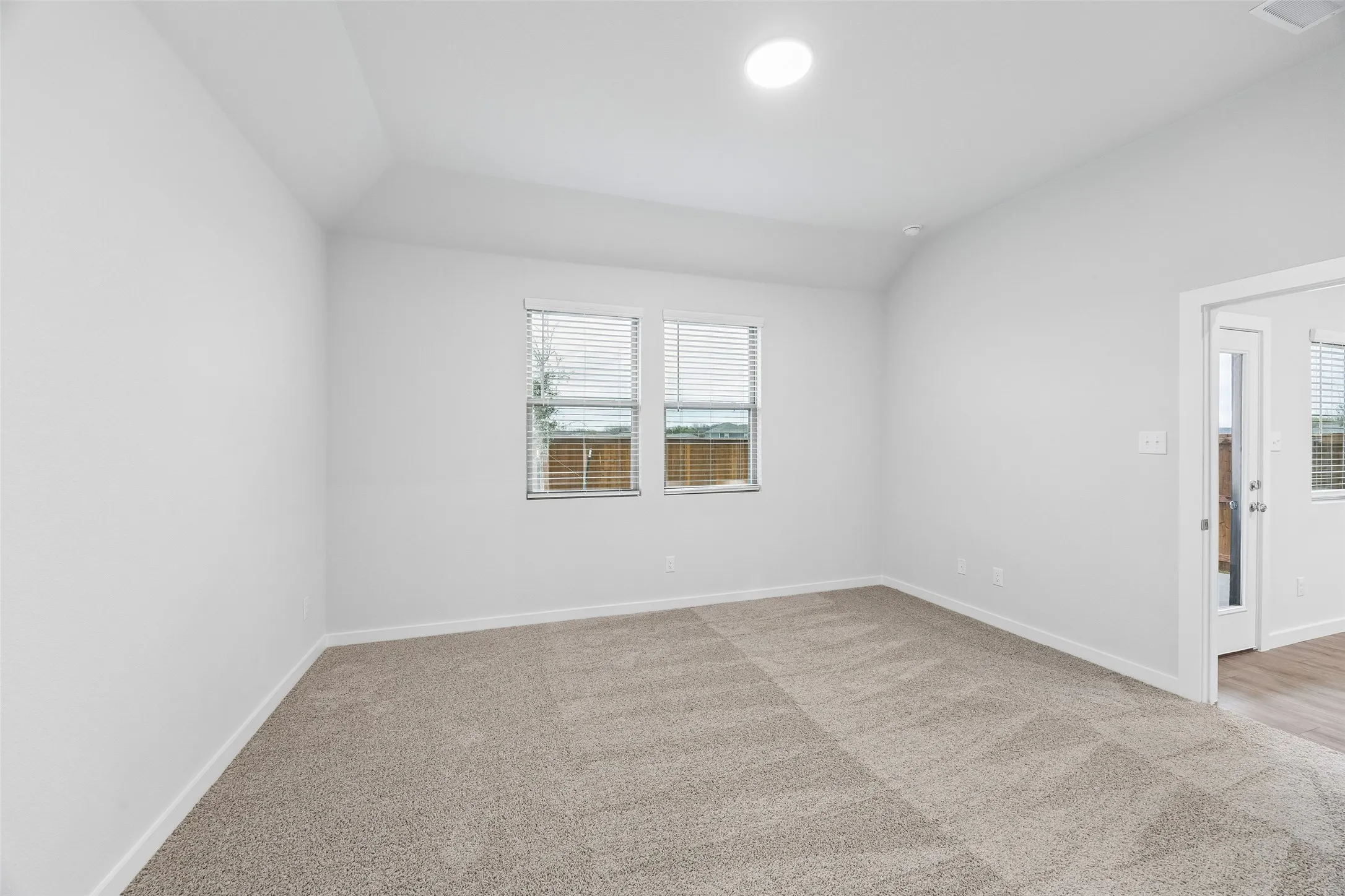 Primary Suite in the Cedar home plan by Trophy Signature Homes – REPRESENTATIVE PHOTO
