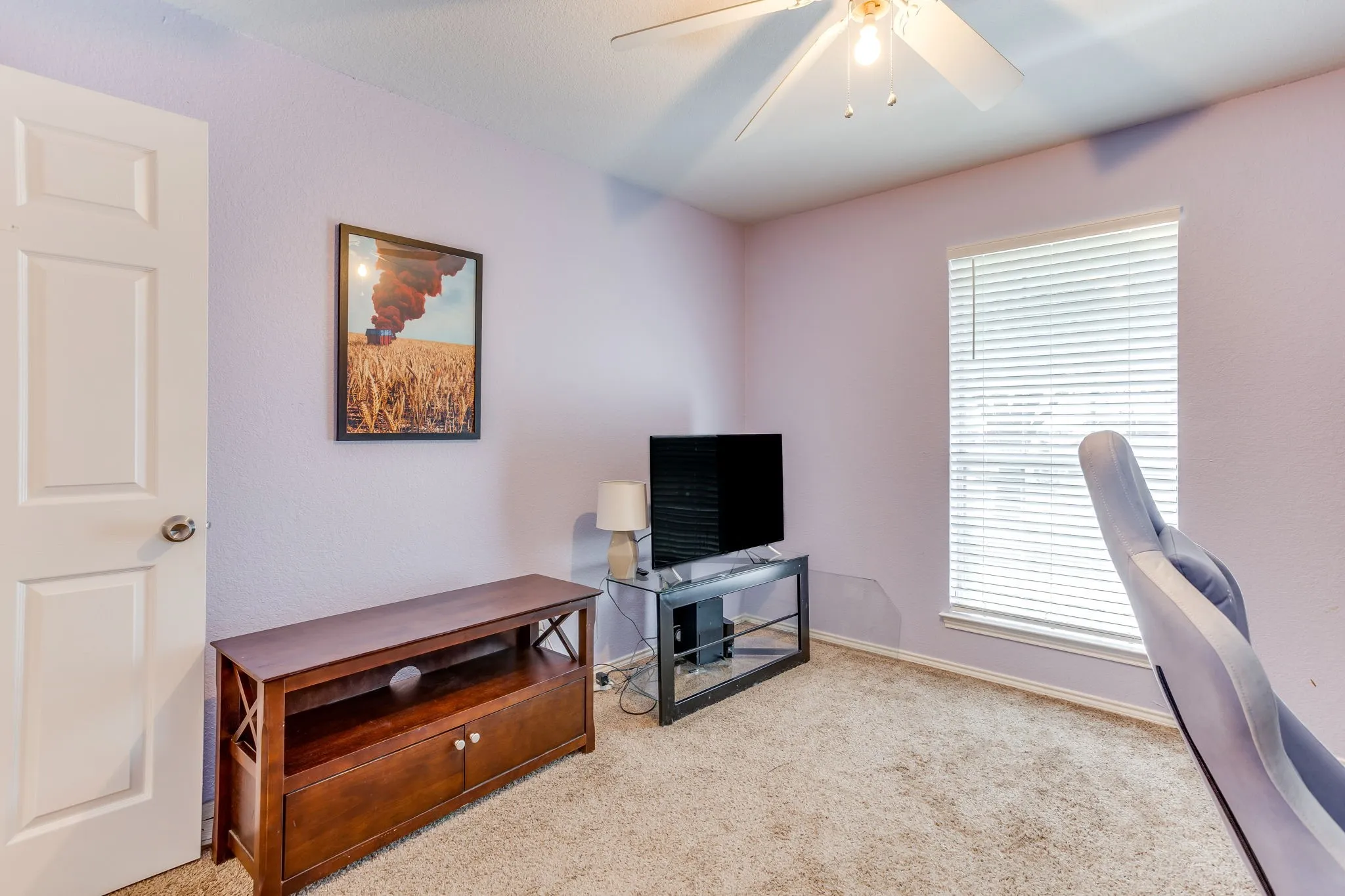 Office featuring neutral colored carpet.