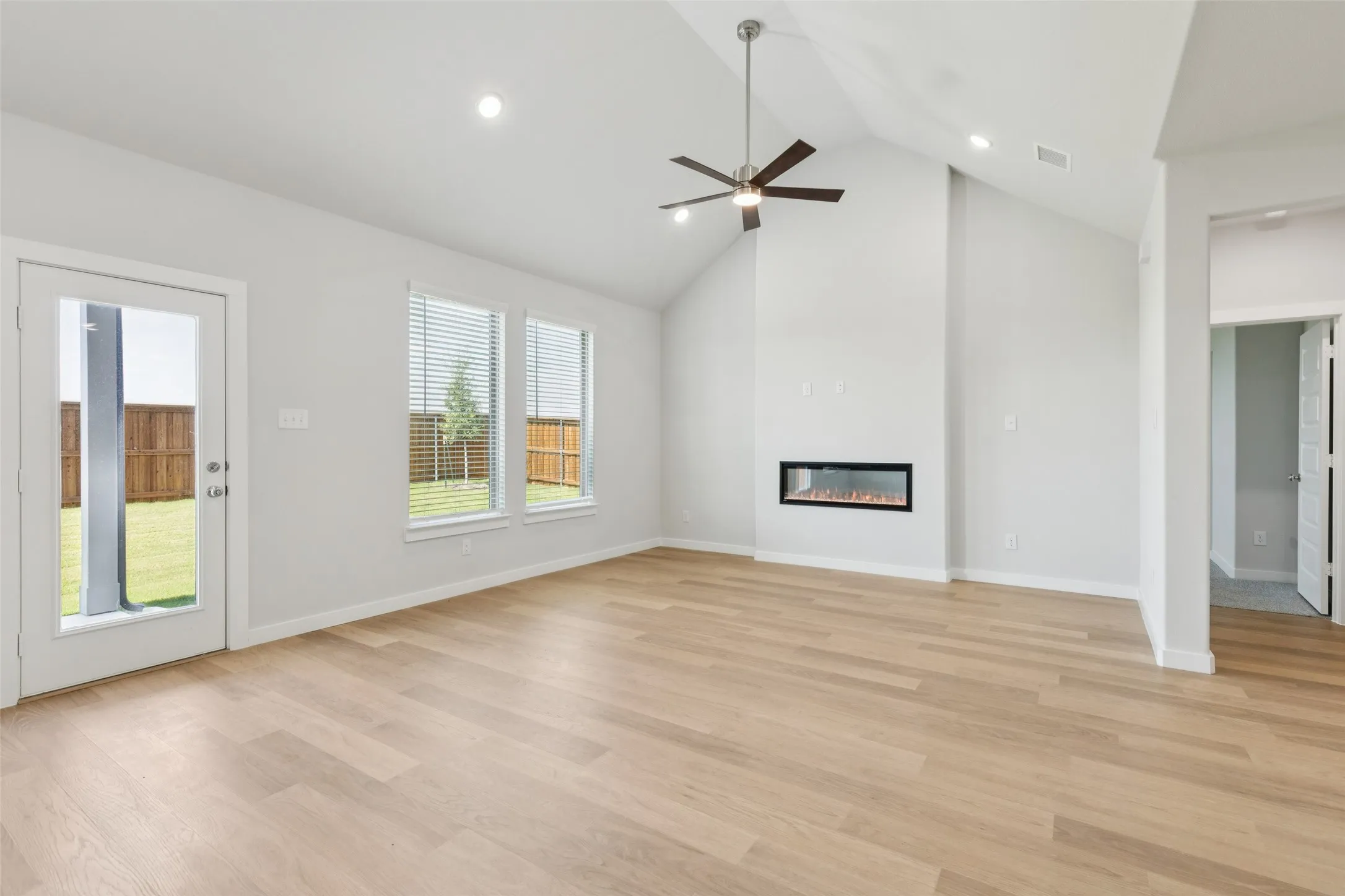 Living Room in the Masters home plan by Trophy Signature Homes – REPRESENTATIVE PHOTO