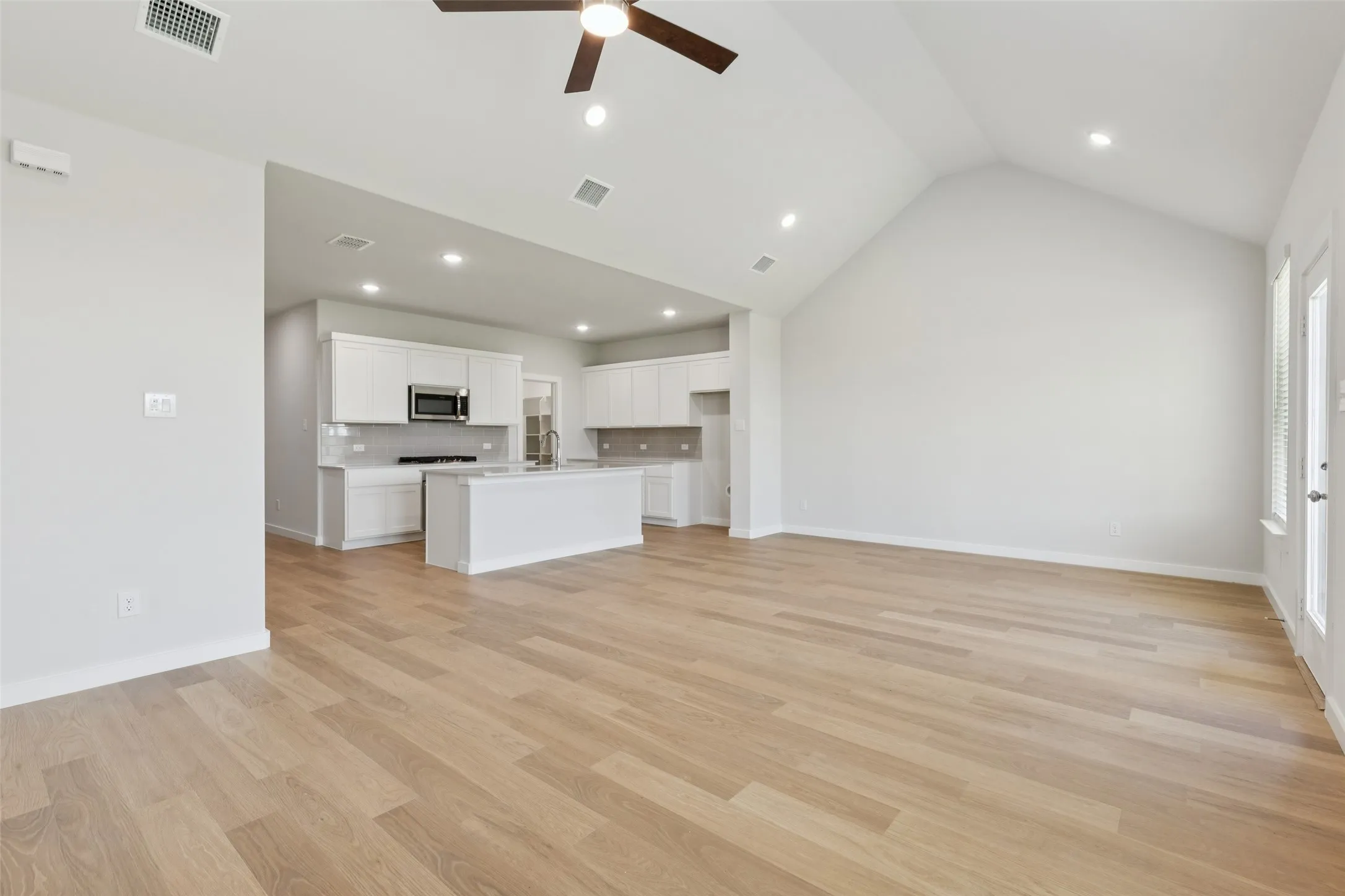 Open first floor in the Masters home plan by Trophy Signature Homes – REPRESENTATIVE PHOTO