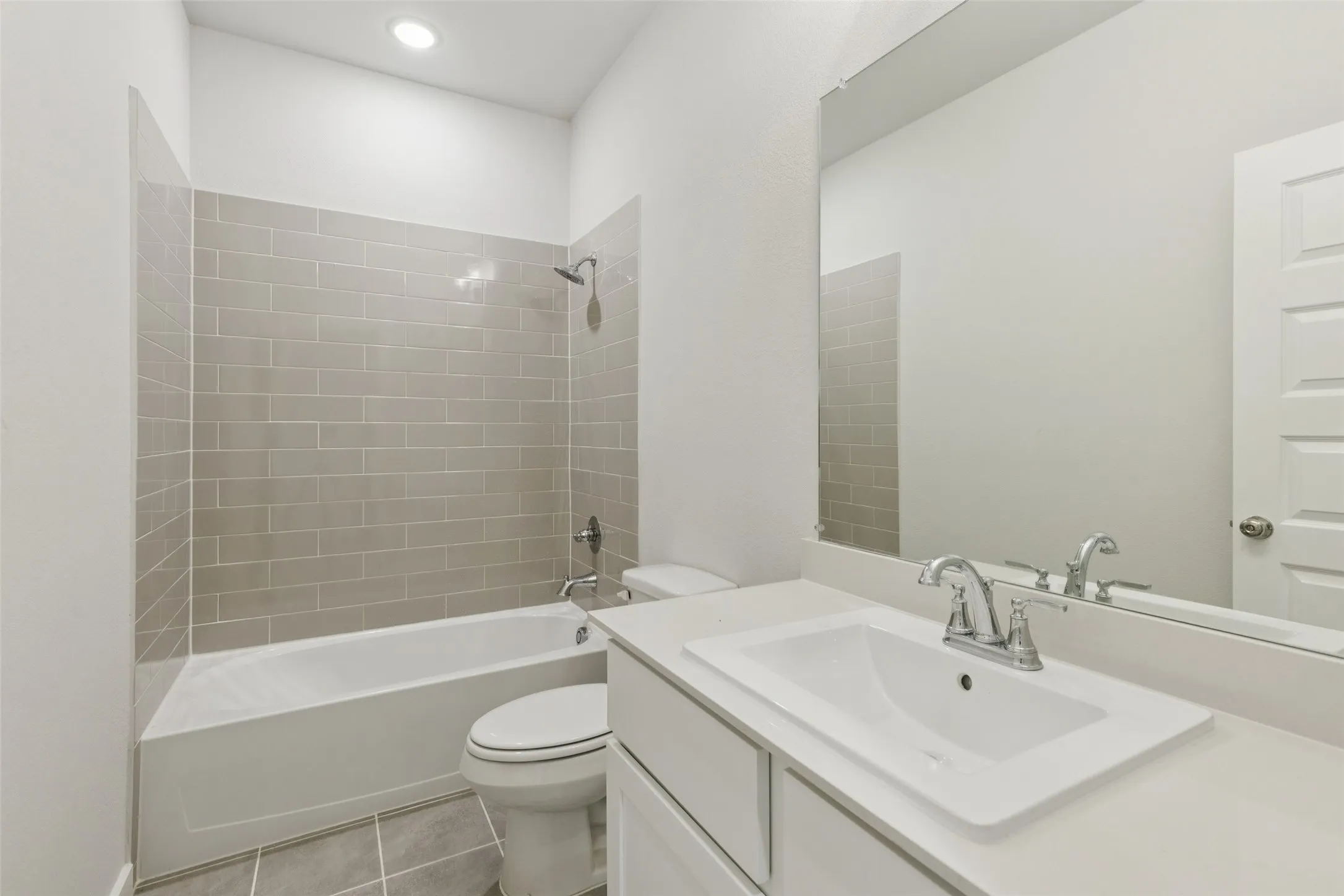 Bathroom in the Masters home plan by Trophy Signature Homes – REPRESENTATIVE PHOTO
