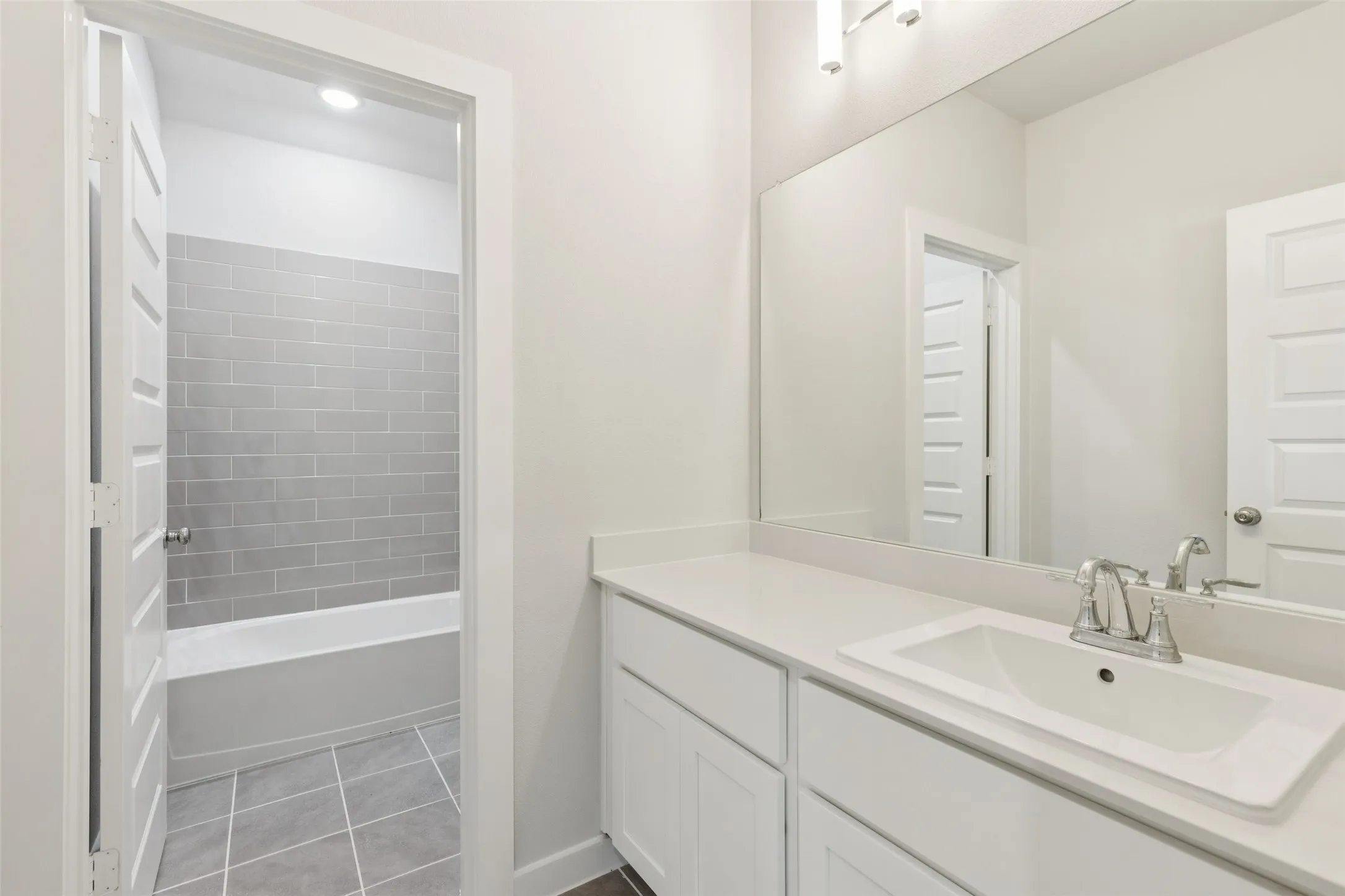 Bathroom in the Masters home plan by Trophy Signature Homes – REPRESENTATIVE PHOTO