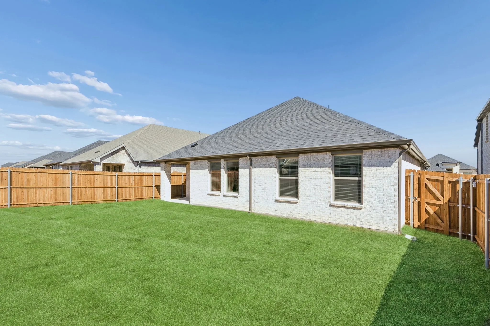 Covered Patio in the Harrison home plan by Trophy Signature Homes – REPRESENTATIVE PHOTO
