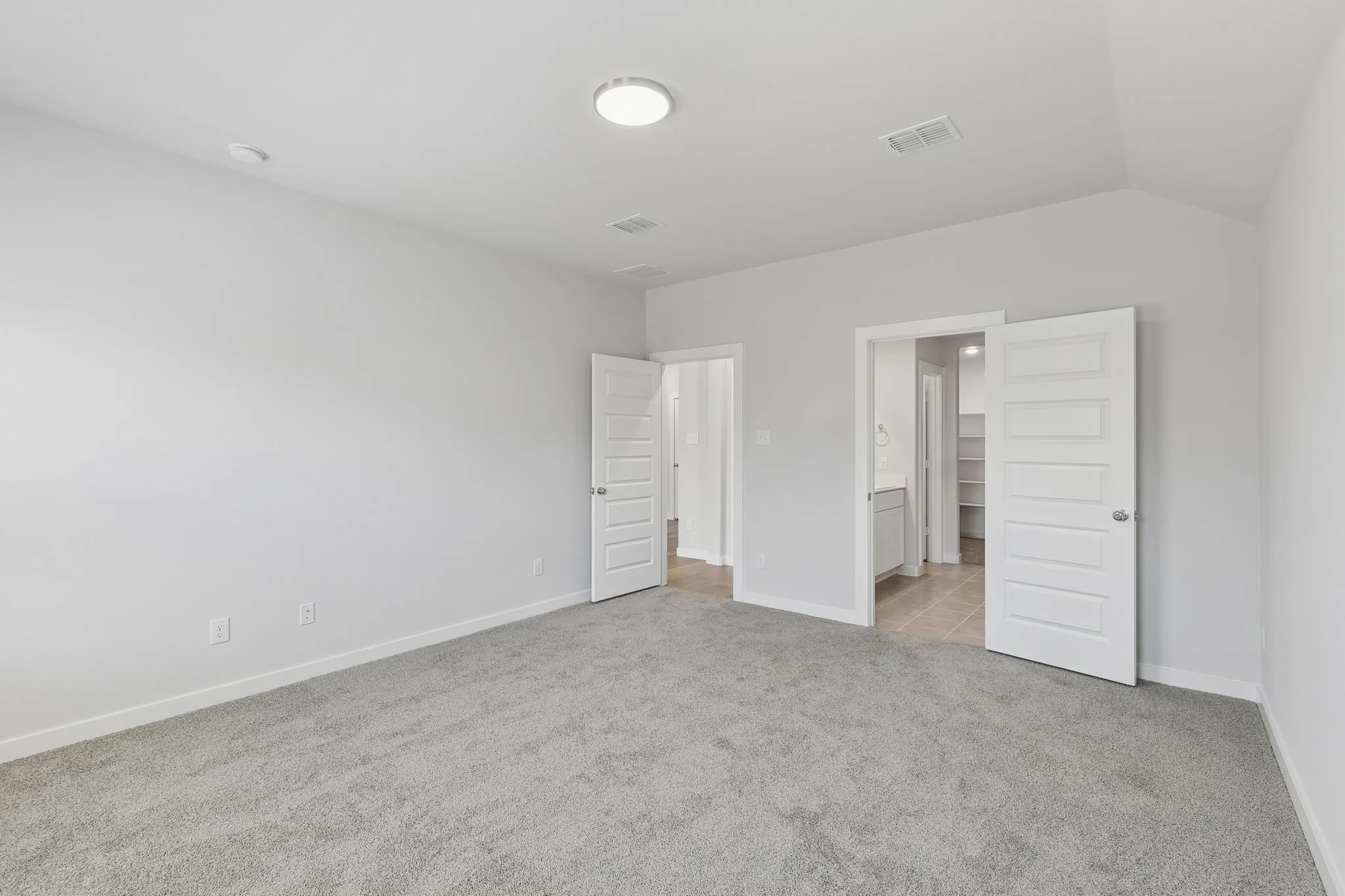 Primary Suite in the Harrison home plan by Trophy Signature Homes – REPRESENTATIVE PHOTO