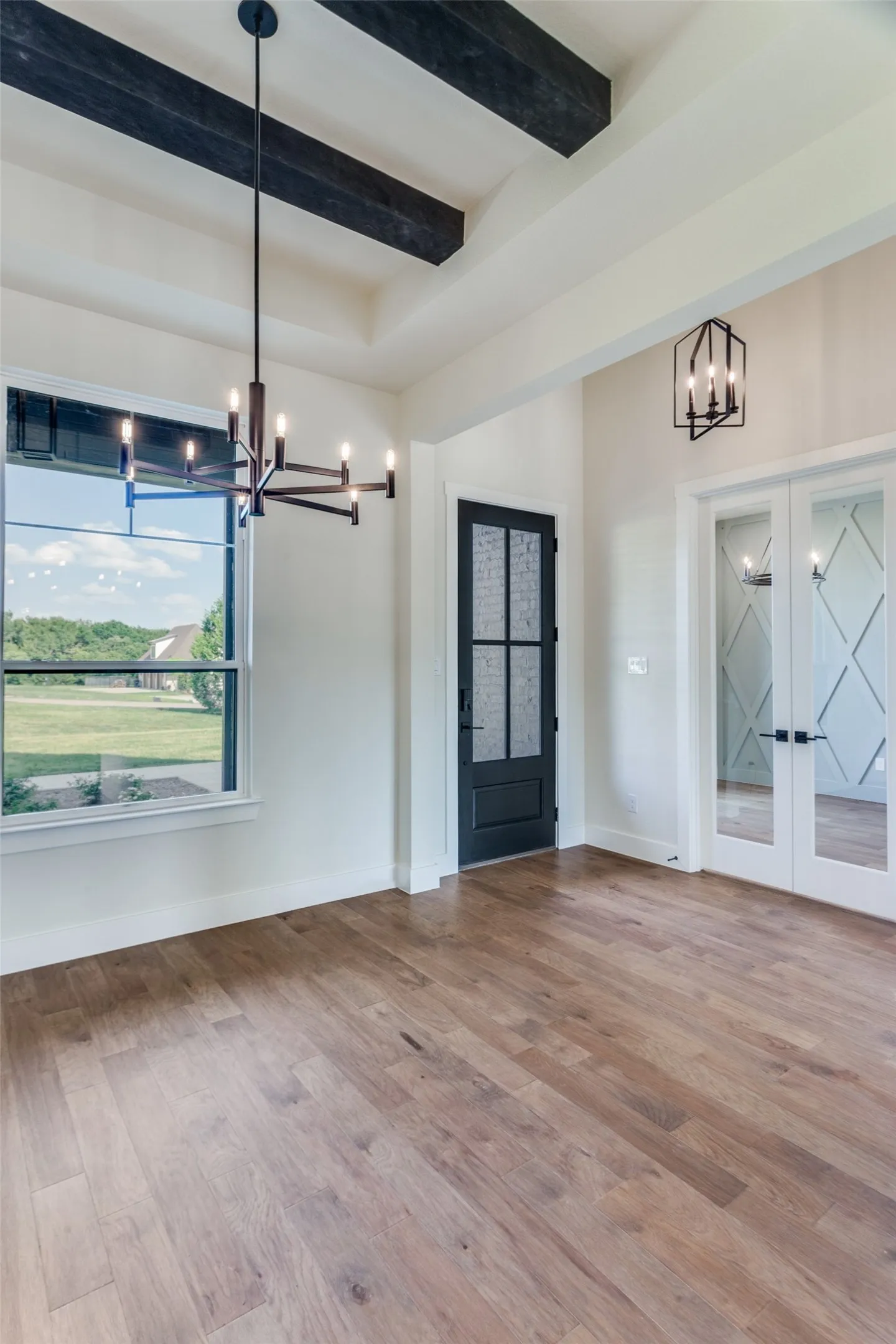 Open Concept Dining Room Across from the Office. Immediately showcasing a home designed for gatherings.
