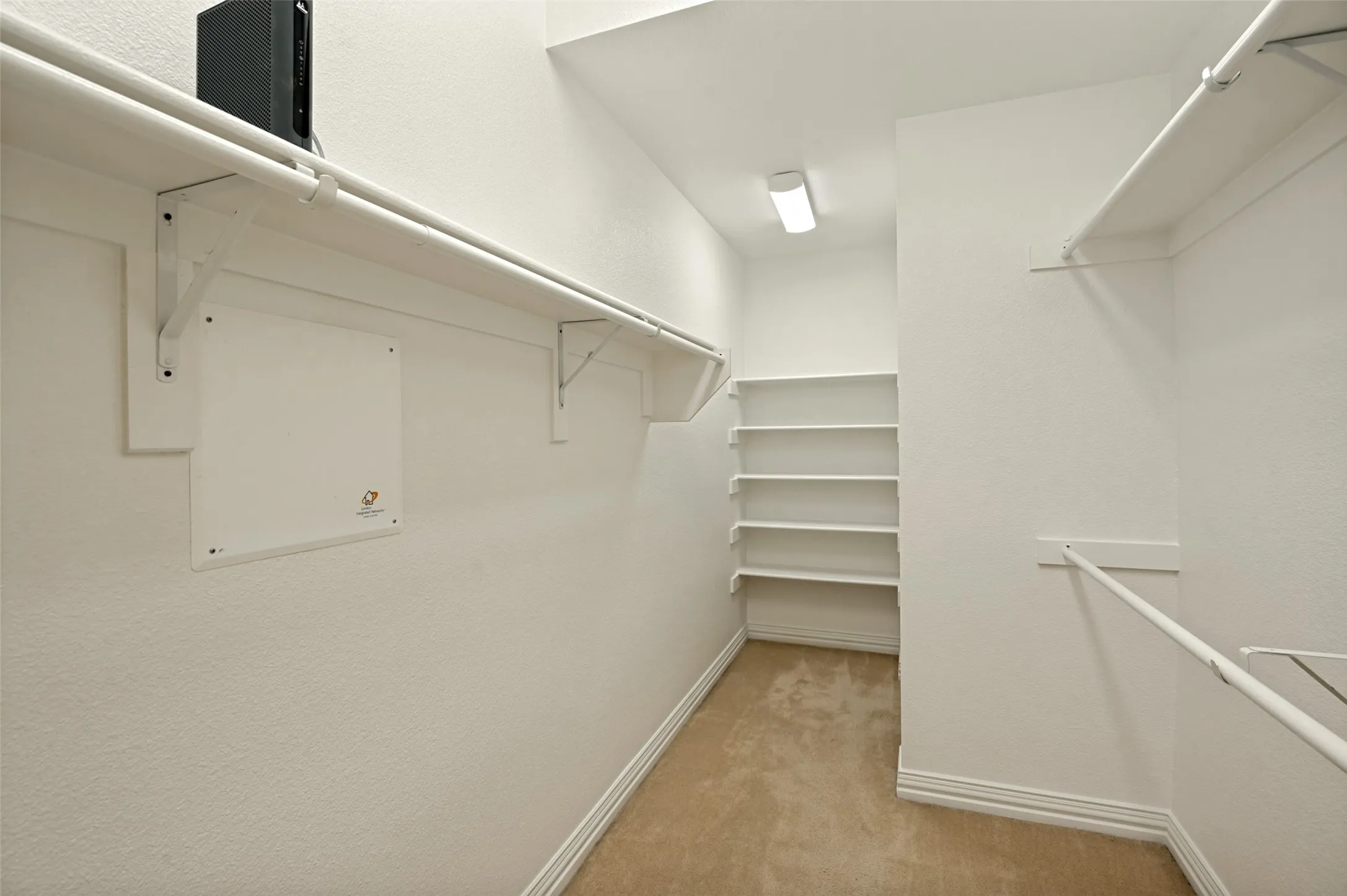 One of the two closets in the primary bathroom.