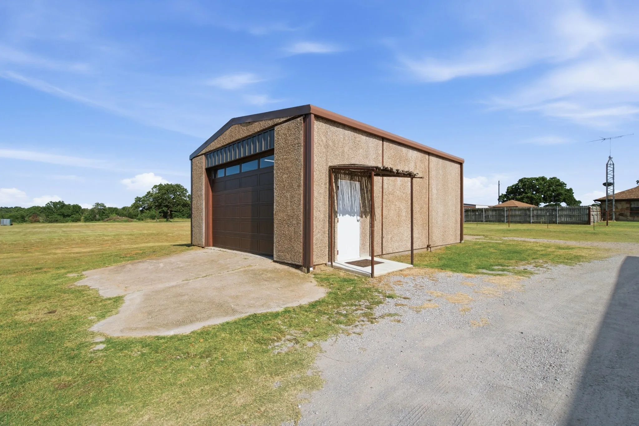 Building #4  23x28 with 2 14x10 Roll Up Doors