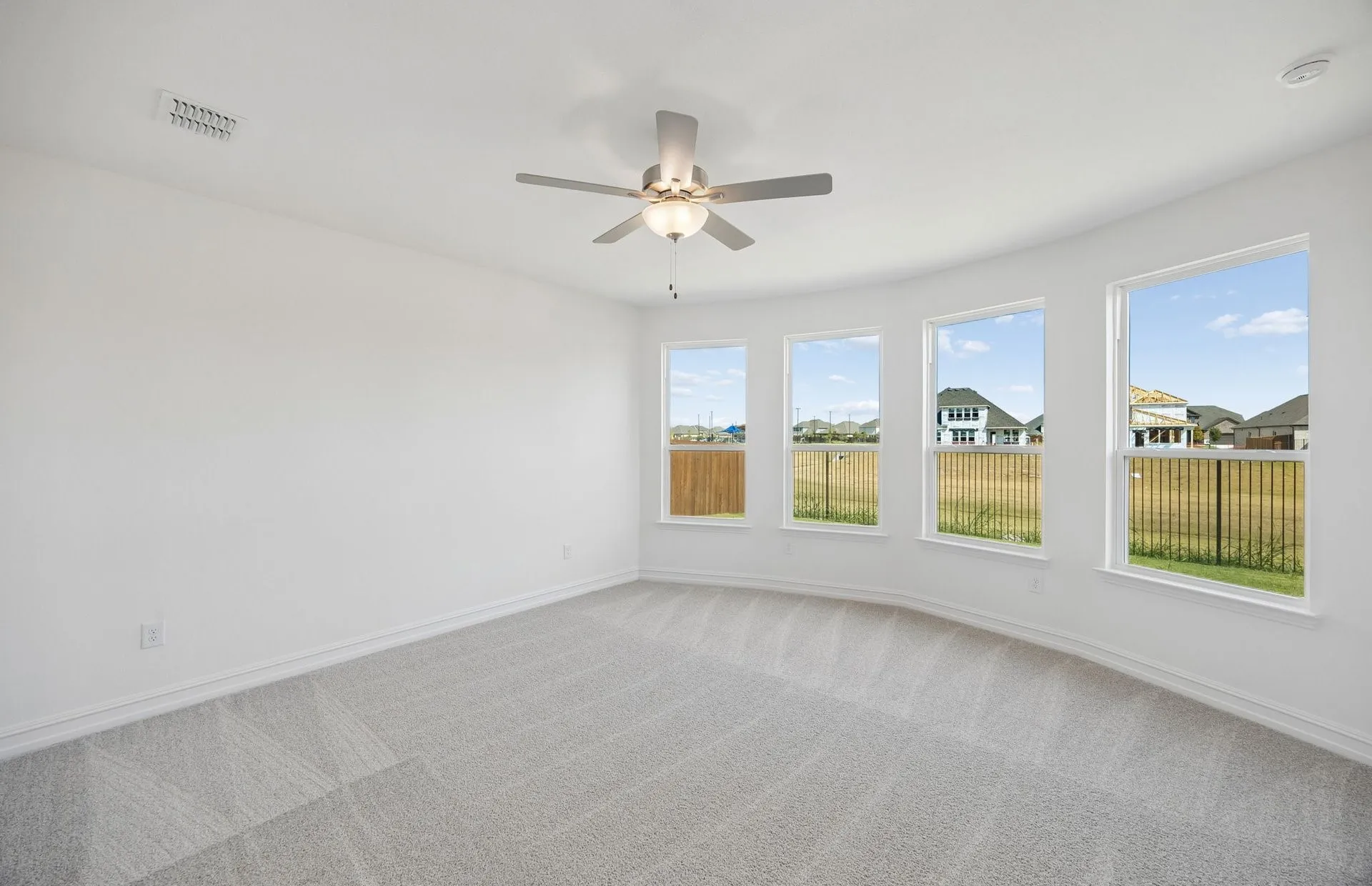 Bay windows in primary bedroom