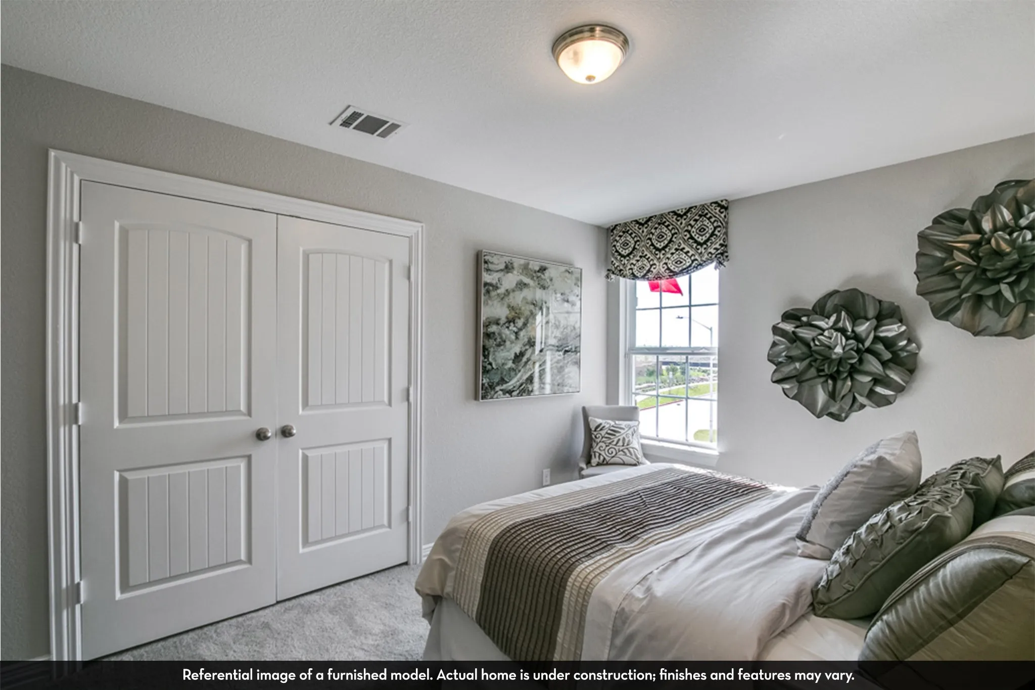 Room featuring a double window with a patterned valance, light gray walls, and recessed lighting