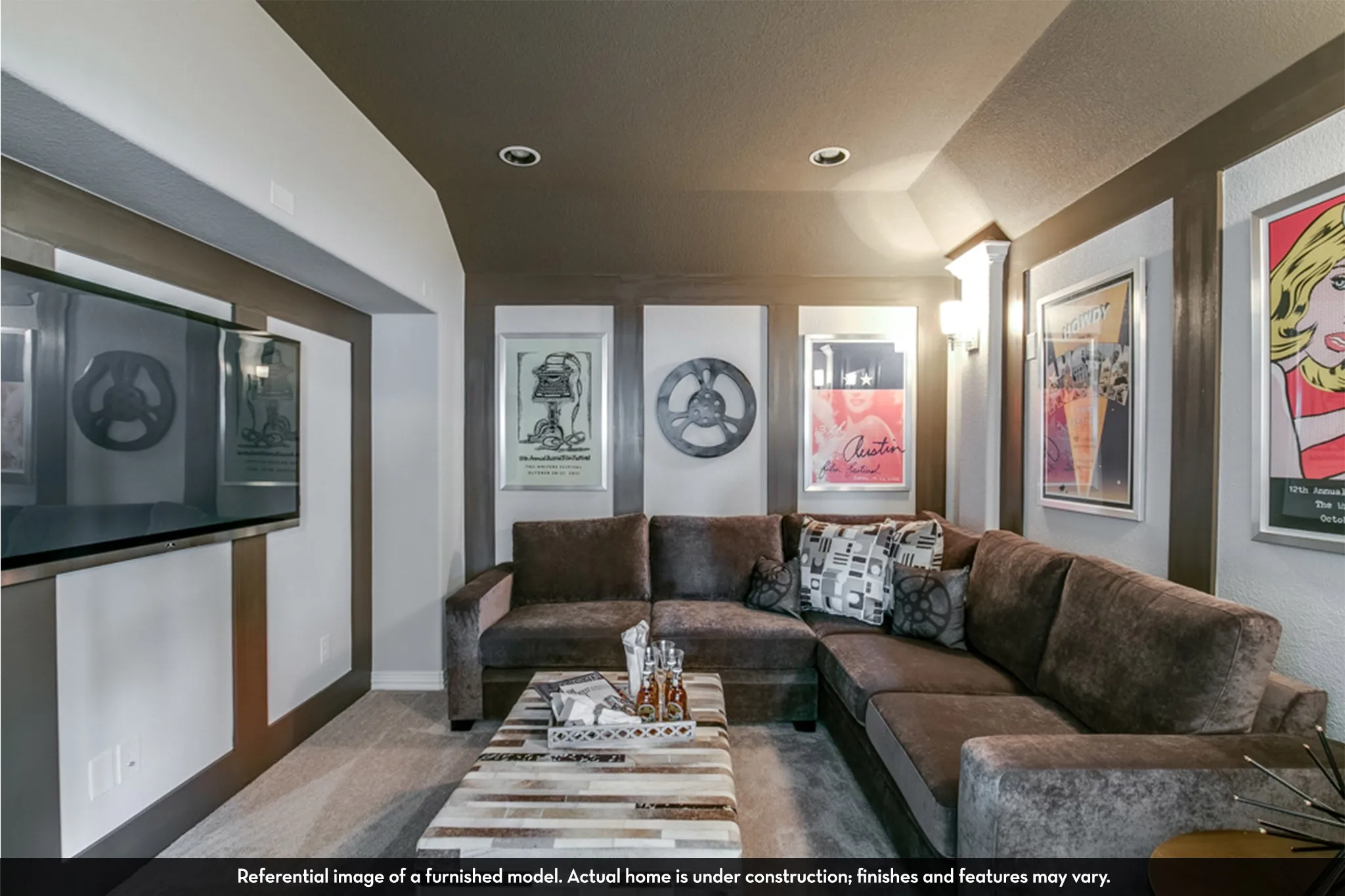 Entertainment room featuring a built-in television recess, sconce lighting, recessed ceiling lights, and carpeted flooring