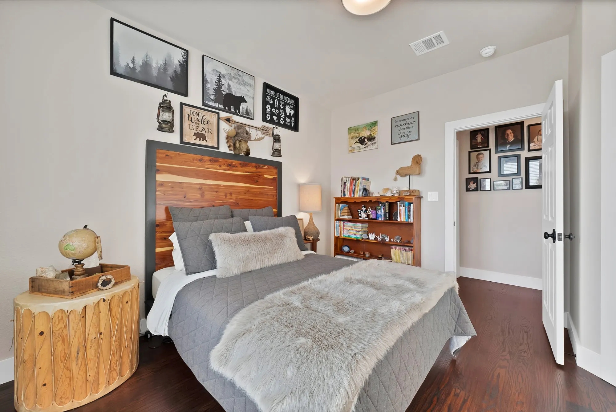 Room featuring dark wood-finish flooring and light wall paint