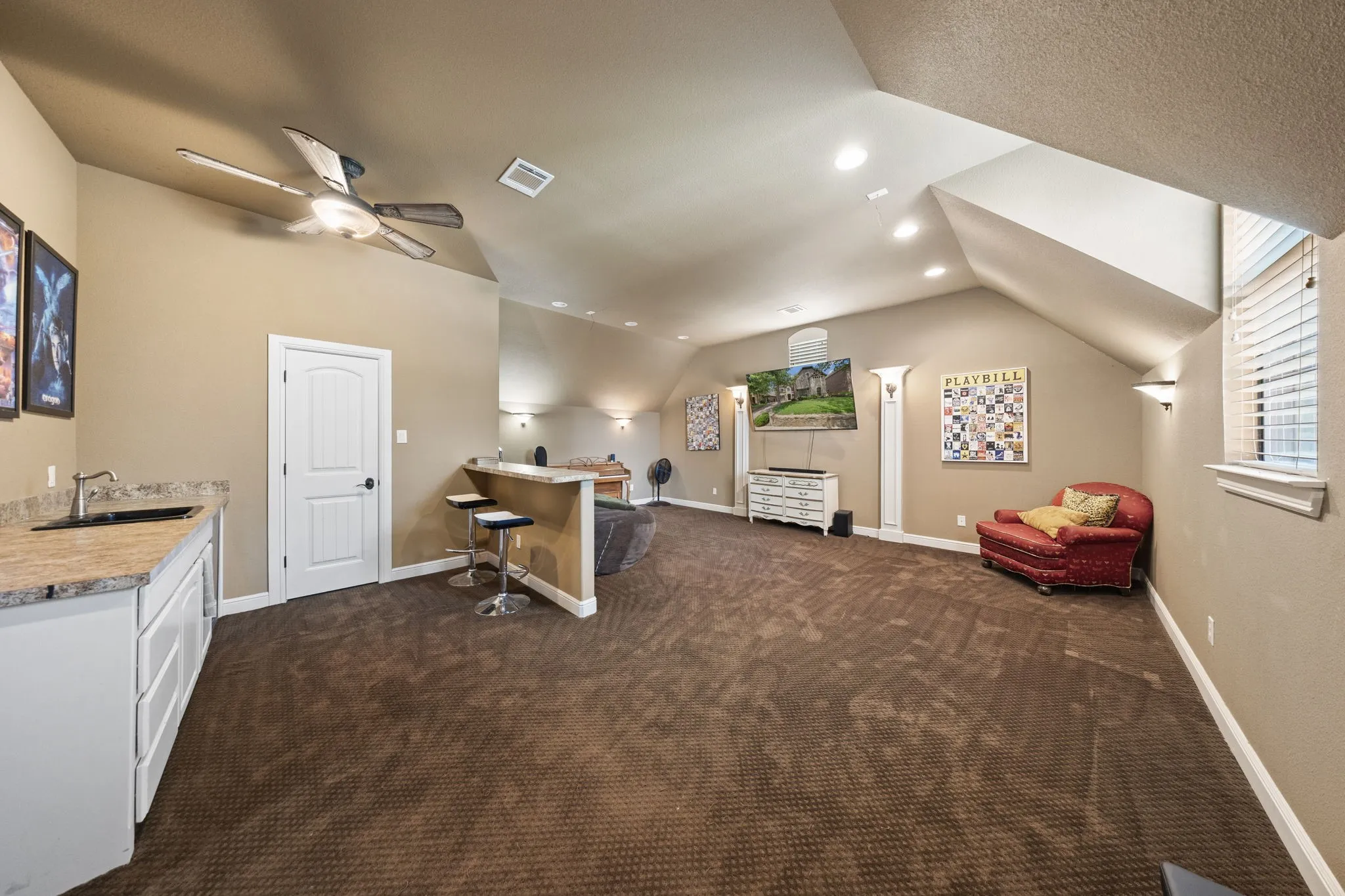 Kitchenette and walk in attic.