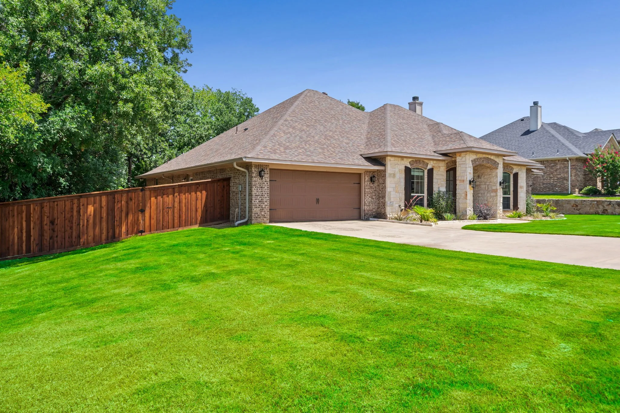 Large lot with plenty of yard and a new wood cap fence.