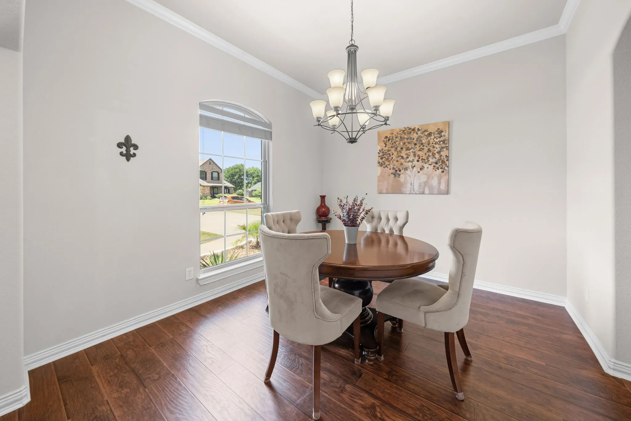 Dining room with beautiful engineered wood floors.