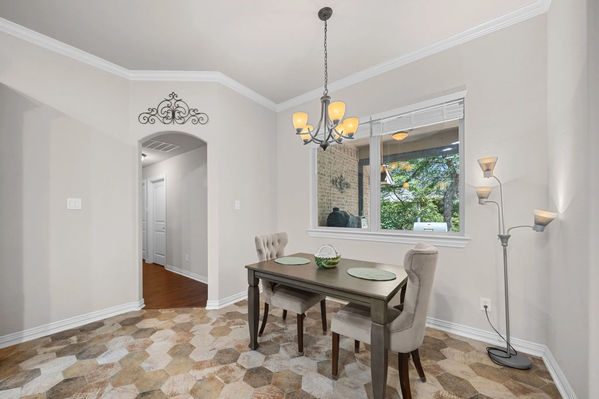Breakfast area with new tile floors and lots of natural light.
