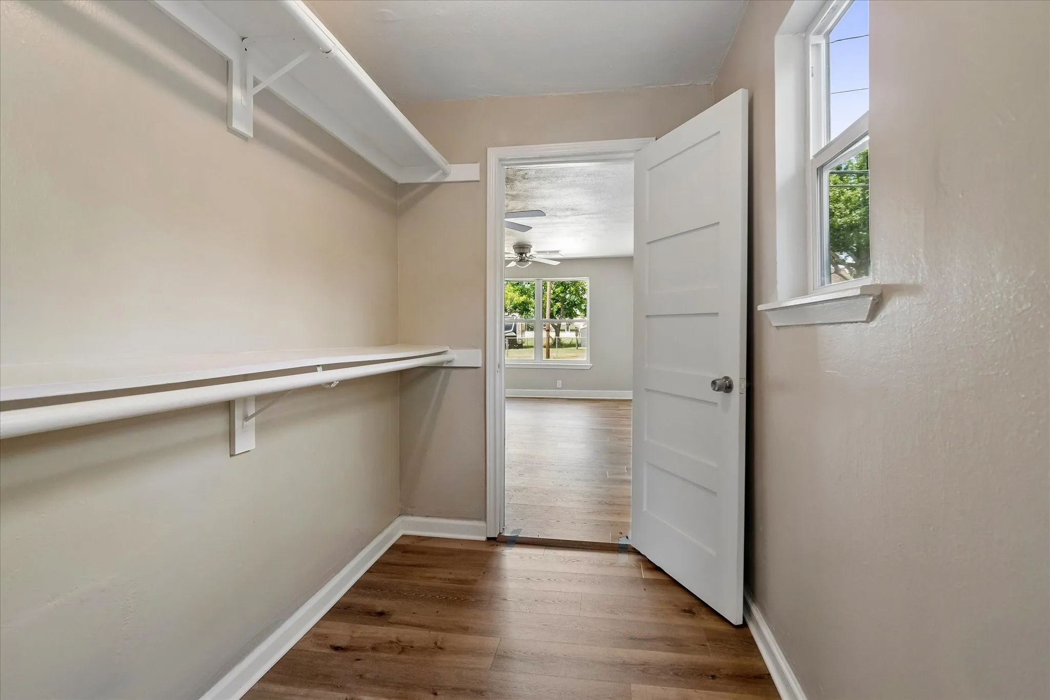 Walk thru closet from bonus room to primary bedroom