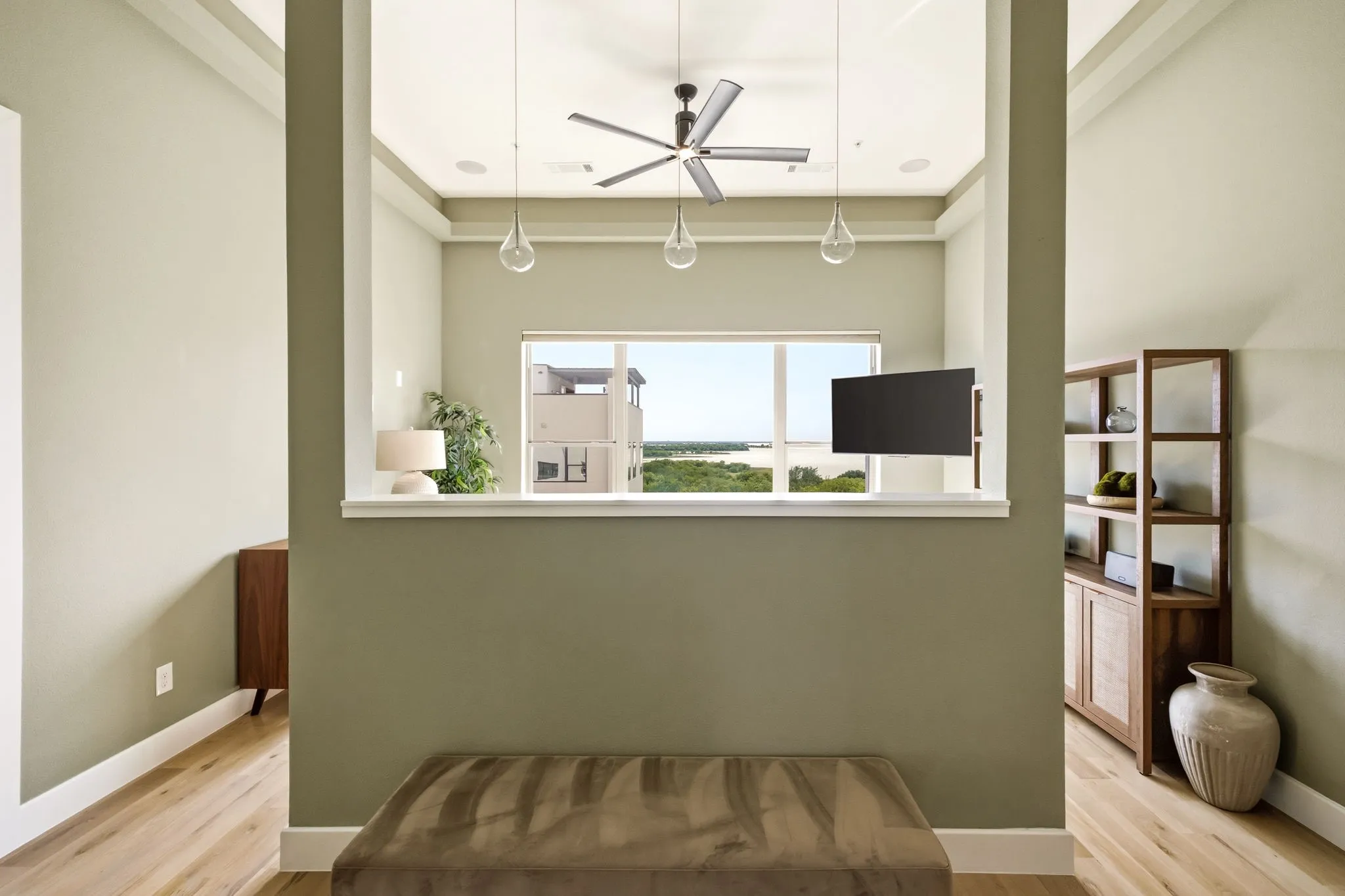 Relaxing primary suite with unobstructed water views